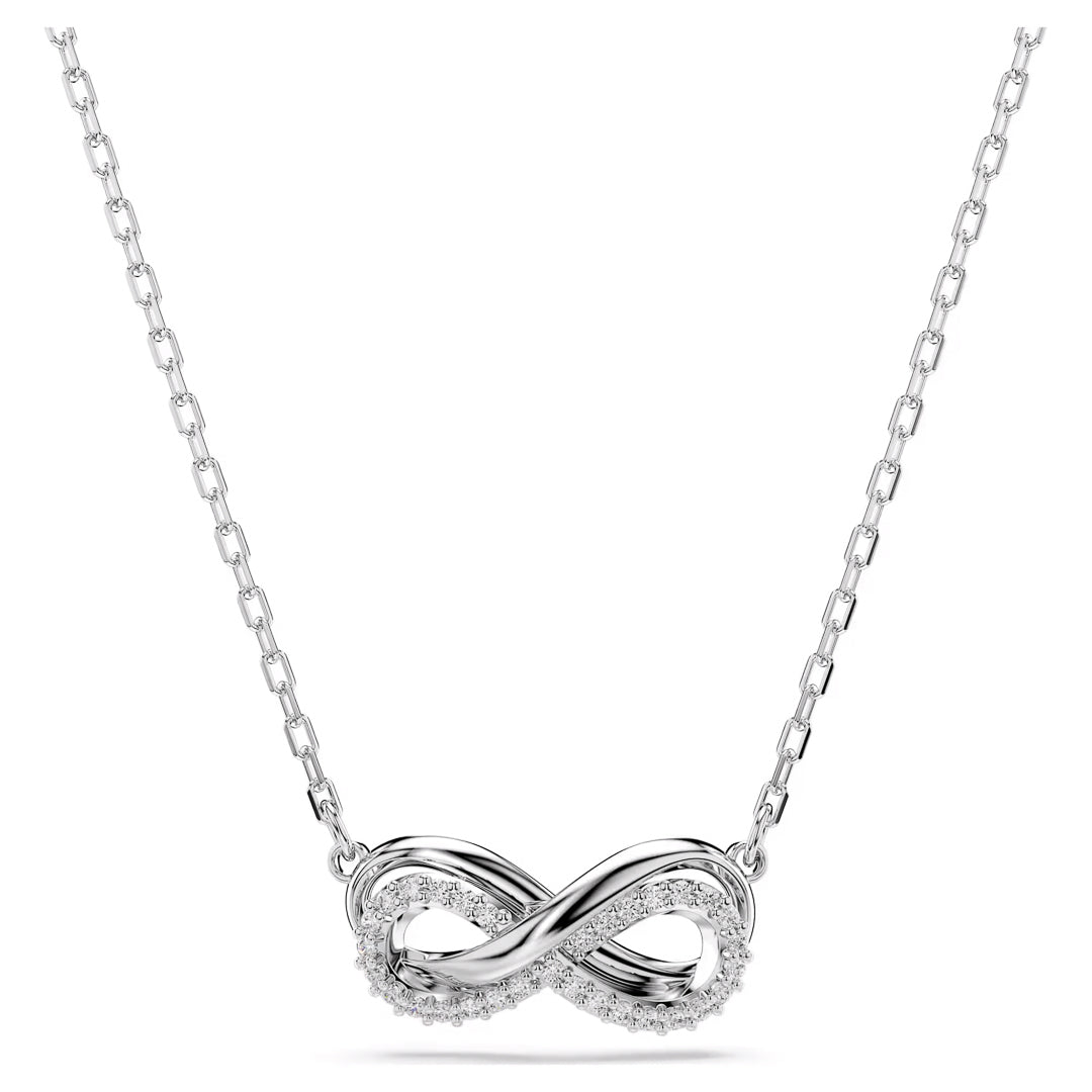 The Swarovski Hyperbola Necklace Pendant by Swarovski features a sleek silver chain adorned with an infinity symbol pendant, elegantly embellished with small, sparkling Swarovski Zirconia gemstones.