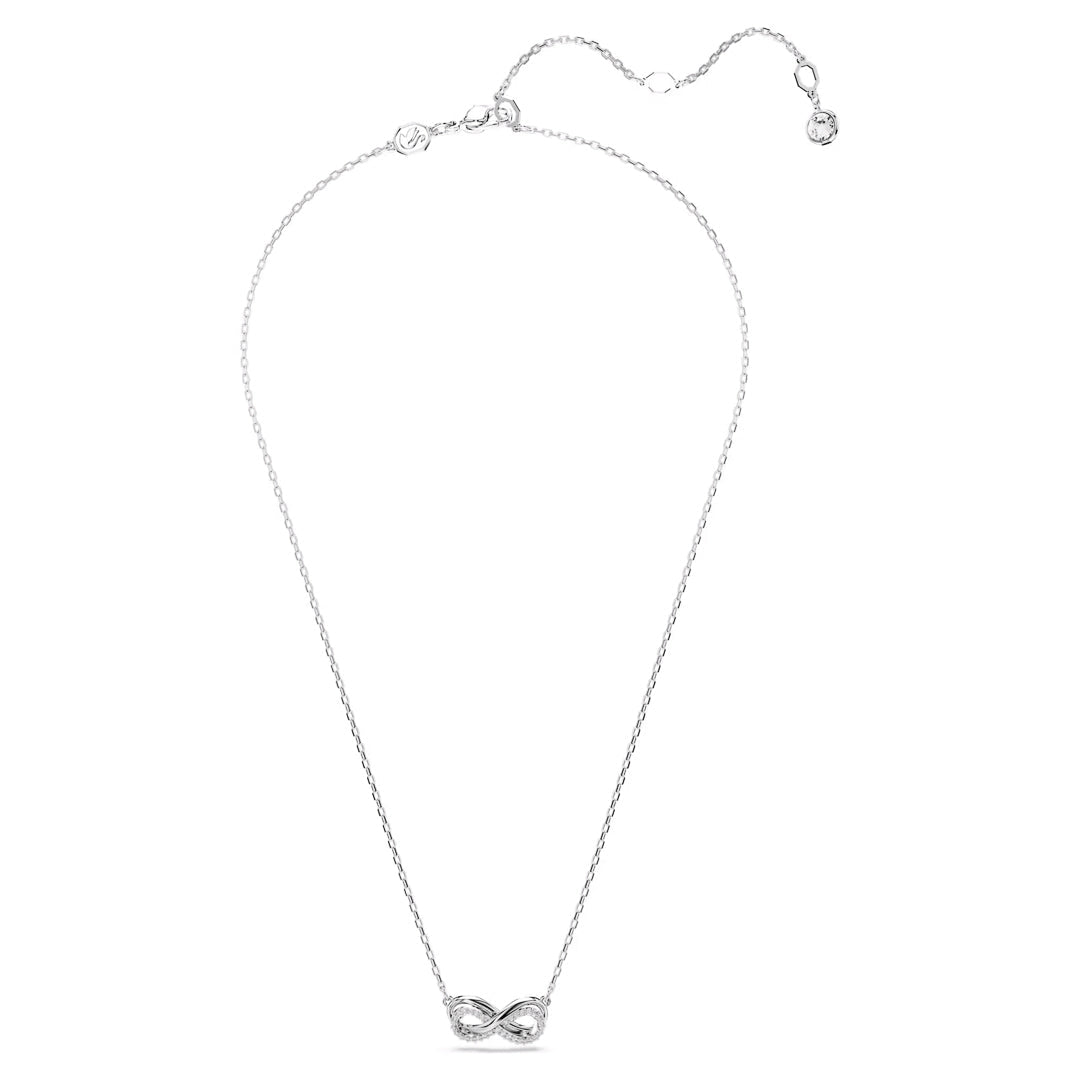 The Swarovski Hyperbola Necklace Pendant by Swarovski is a delicate silver piece showcasing an infinity symbol adorned with sparkling Swarovski Zirconia crystals. The adjustable chain features a lobster clasp and a small charm at the end, elegantly displayed on a plain white background.