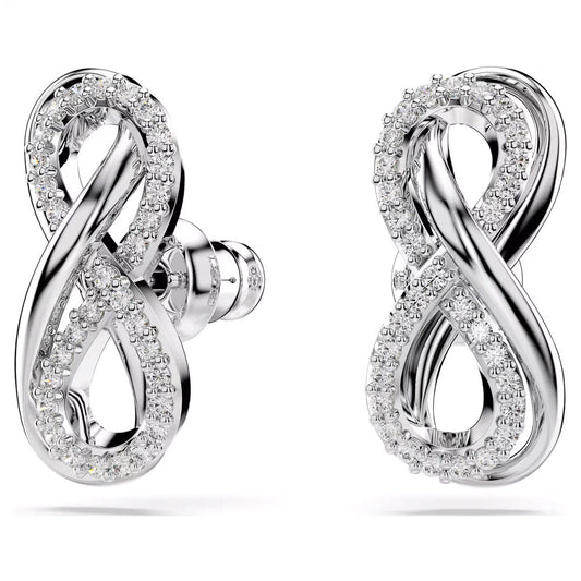 Explore the Swarovski Hyperbola Stud Earrings, a sophisticated pair of rhodium-plated silver earrings embellished with small sparkling diamonds. These elegant accessories, crafted by Swarovski, showcase a stunning polished finish and stud backings that enhance any outfit with their refined elegance.