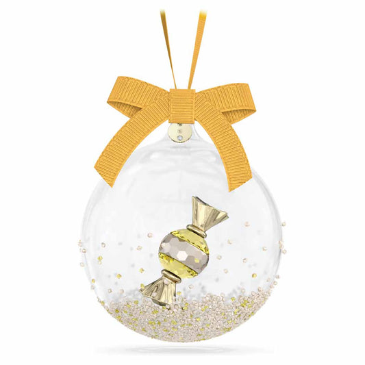 The Swarovski Holiday Cheers Dulcis Bell Ornament Home Décor is a transparent ornament showcasing a gold-wrapped candy inside, embellished with small gold and white beads. It is beautifully topped with a large gold ribbon bow and hangs from a matching gold string, making it an ideal festive crystal rocks decoration.