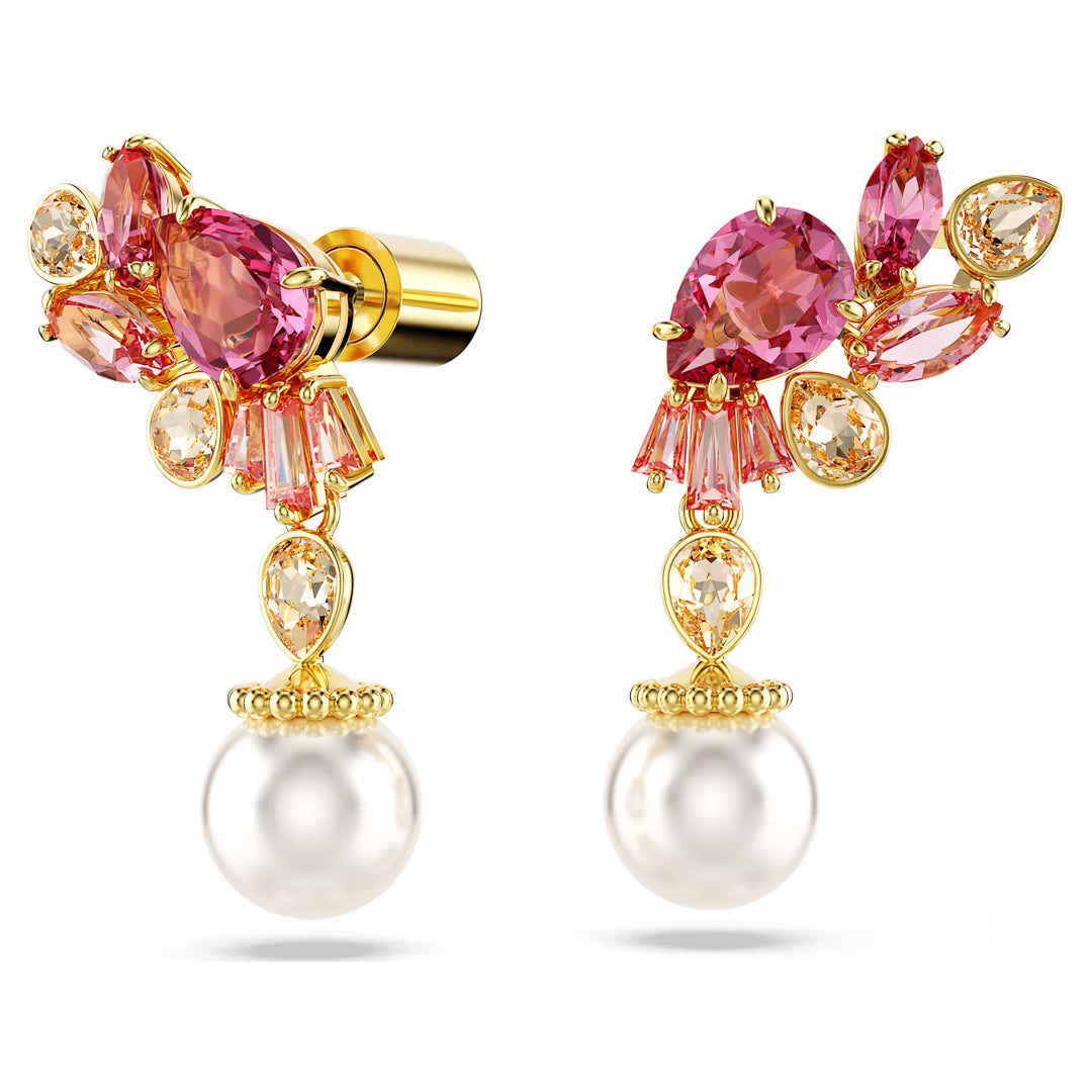 The Swarovski Gema Drop Earrings by Swarovski are gold-tone plated, showcasing cherry blossom motifs adorned with pink and orange gemstones in various shapes, featuring dangling white pearls and sparkling Swarovski Zirconia accents.