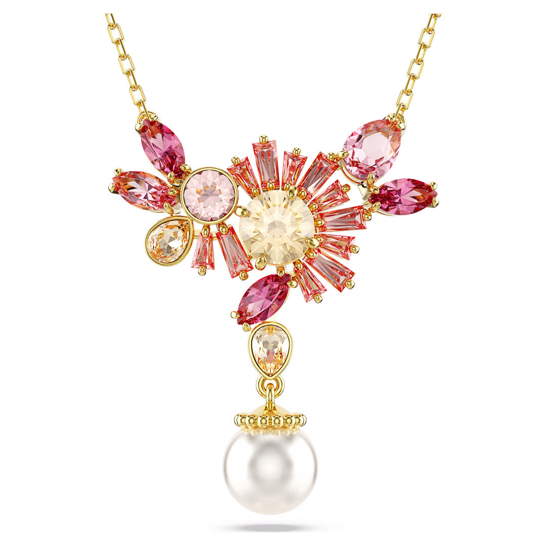 The Swarovski Gema Necklace Pendant by Swarovski features a central design embellished with an array of pink and clear gemstones, evoking the beauty of cherry blossoms in bloom. The ornate starburst-like arrangement is elegantly completed with a round pearl gracefully suspended at the bottom.