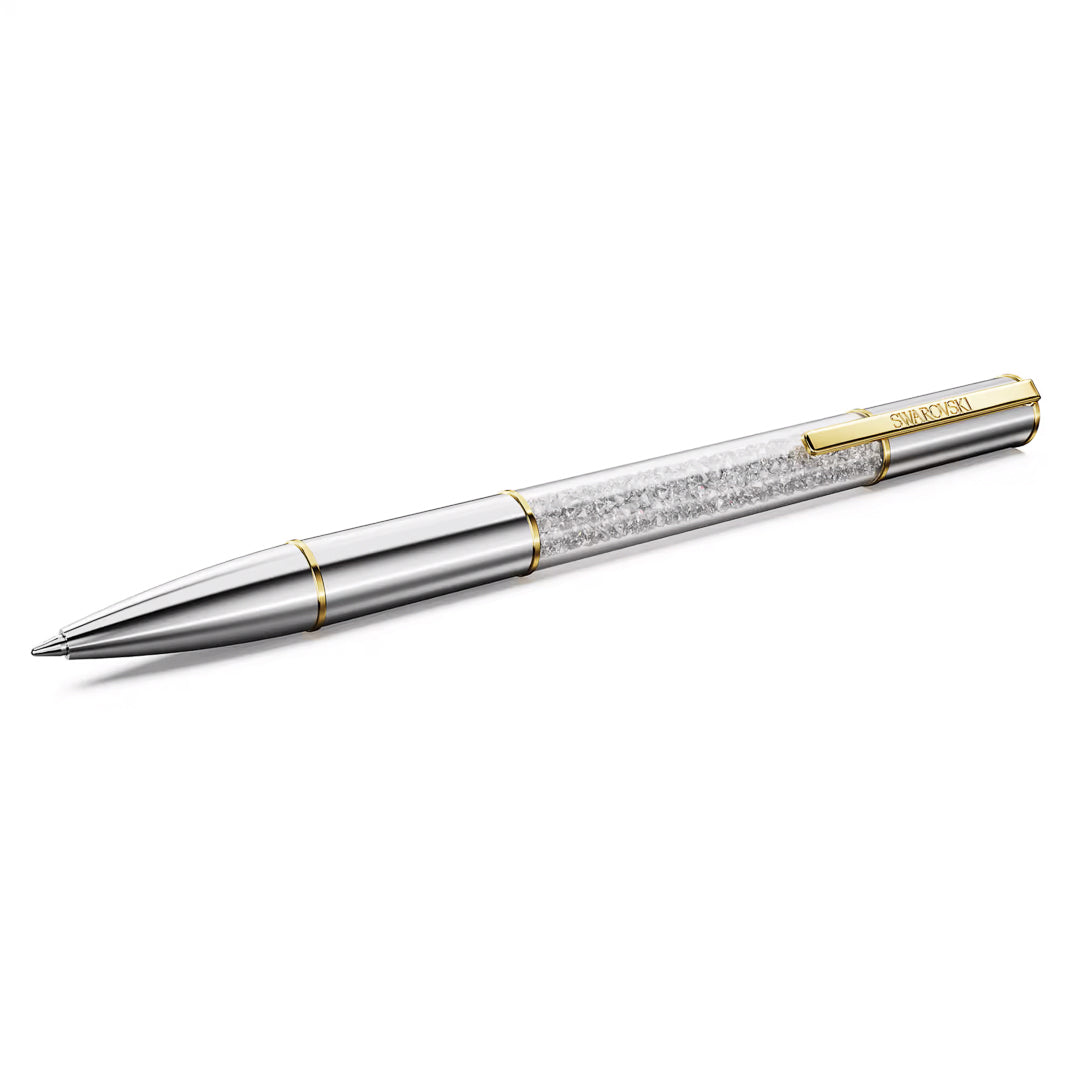 The Swarovski Crystalline Lustre Ballpoint Pen, with its sleek silver and gold body, textured grip section, and cap clip, is artfully positioned diagonally on a white background.