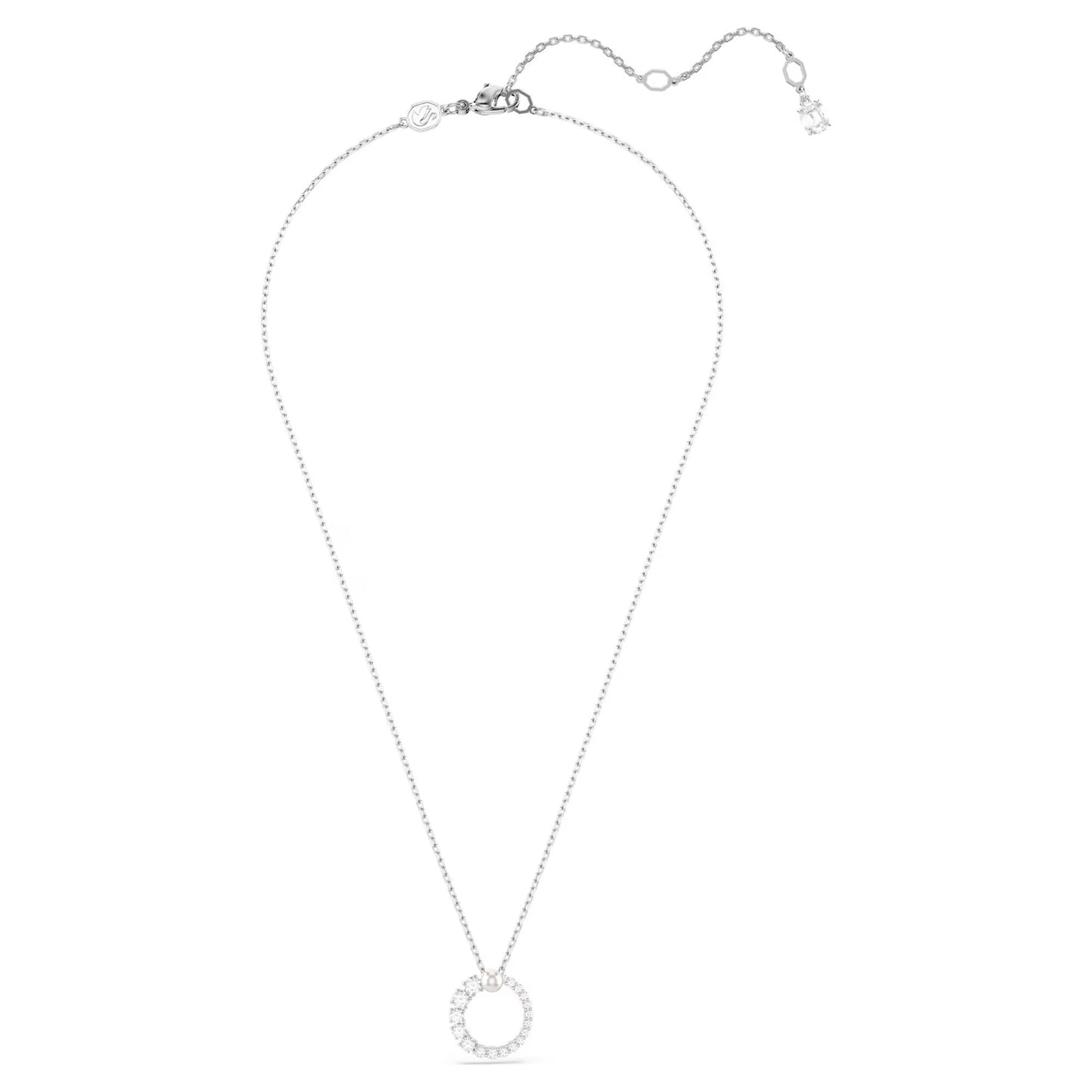 The Swarovski Matrix Necklace Pendant features a delicate chain with a circular pendant adorned with small, sparkling Swarovski Zirconia gemstones. It includes an adjustable clasp and a small charm at the end, capturing an elegant and minimalistic design.