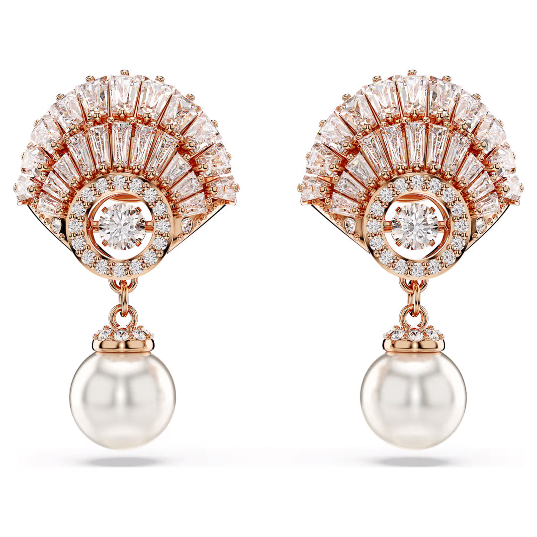 Introducing the Swarovski Idyllia Drop Earrings, a stunning pair of accessories featuring a fan-shaped cluster of baguette and round-cut diamonds in a rose gold-tone plated setting, each embellished with a dangling white pearl.