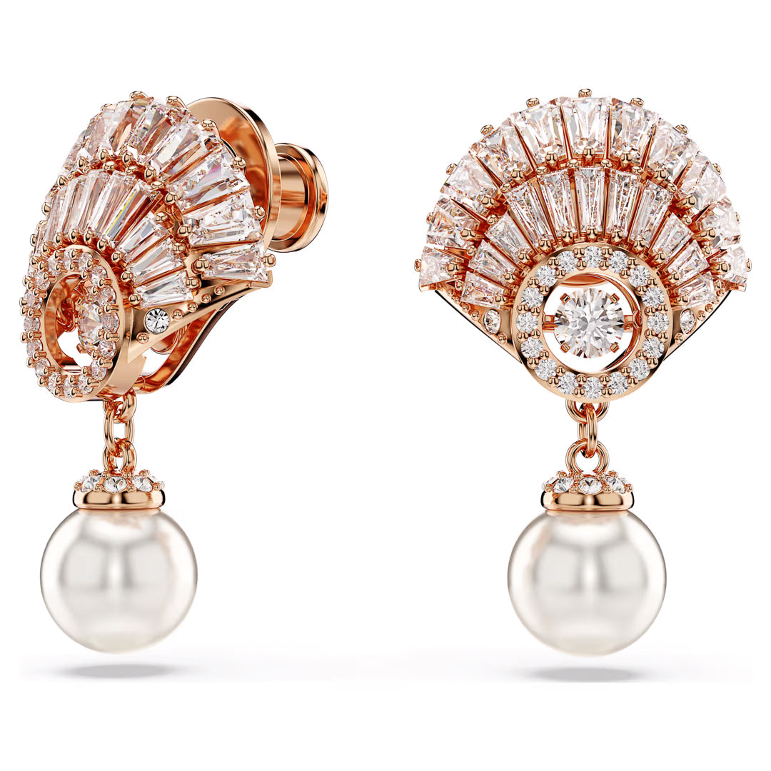 The Swarovski Idyllia Drop Earrings by Swarovski showcase fan-shaped patterns in a rose gold-tone plated finish, adorned with dazzling Swarovski Zirconia. Each earring is elegantly completed with a dangling pearl at the bottom, adding a timeless elegance to their intricate and brilliant design.
