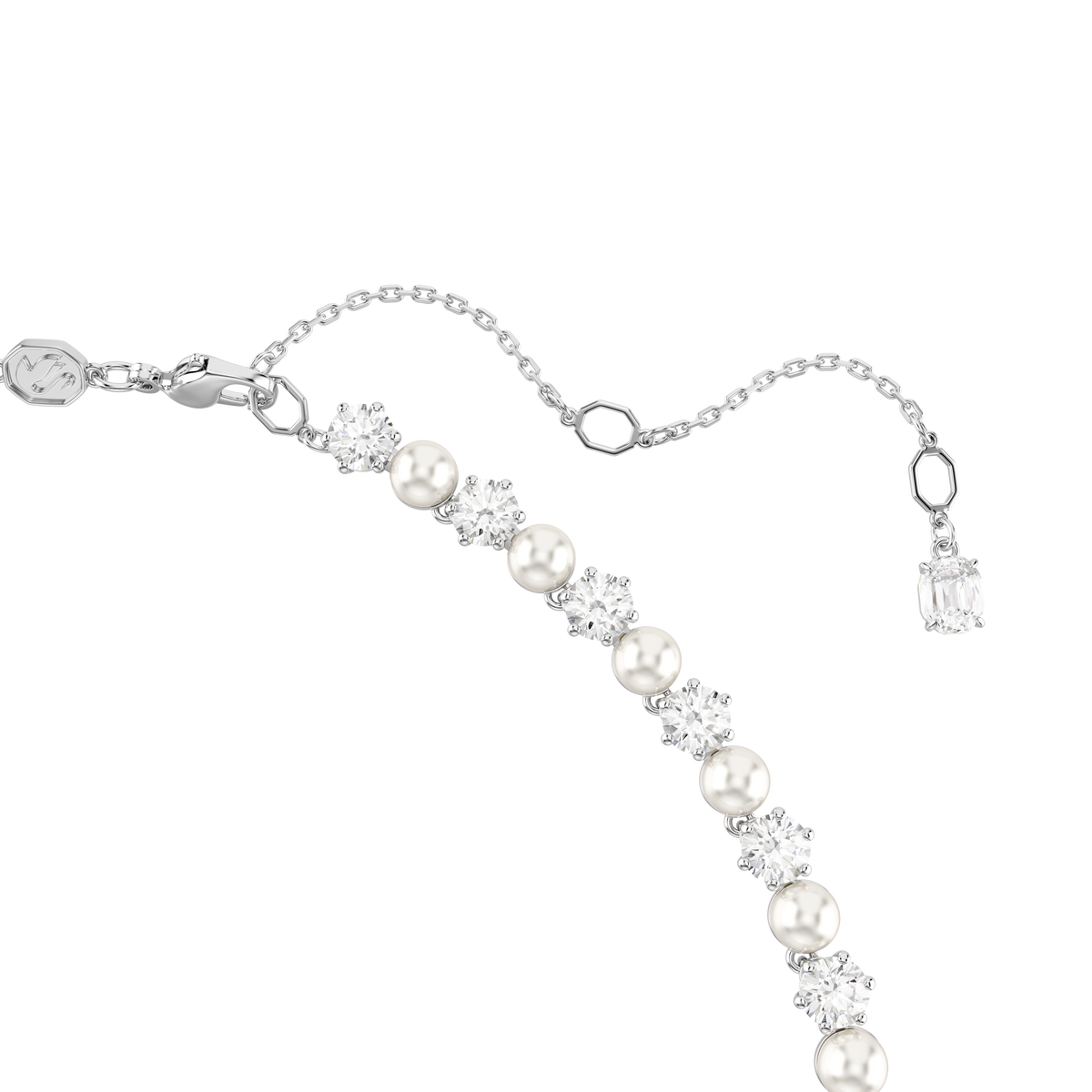 A close-up of the Swarovski Matrix Tennis necklace showcases alternating round crystal pearls and sparkling round-cut Swarovski Zirconia, all elegantly set in rhodium-plated metal with an adjustable clasp and a single gem accent at the end, displayed against a white background.