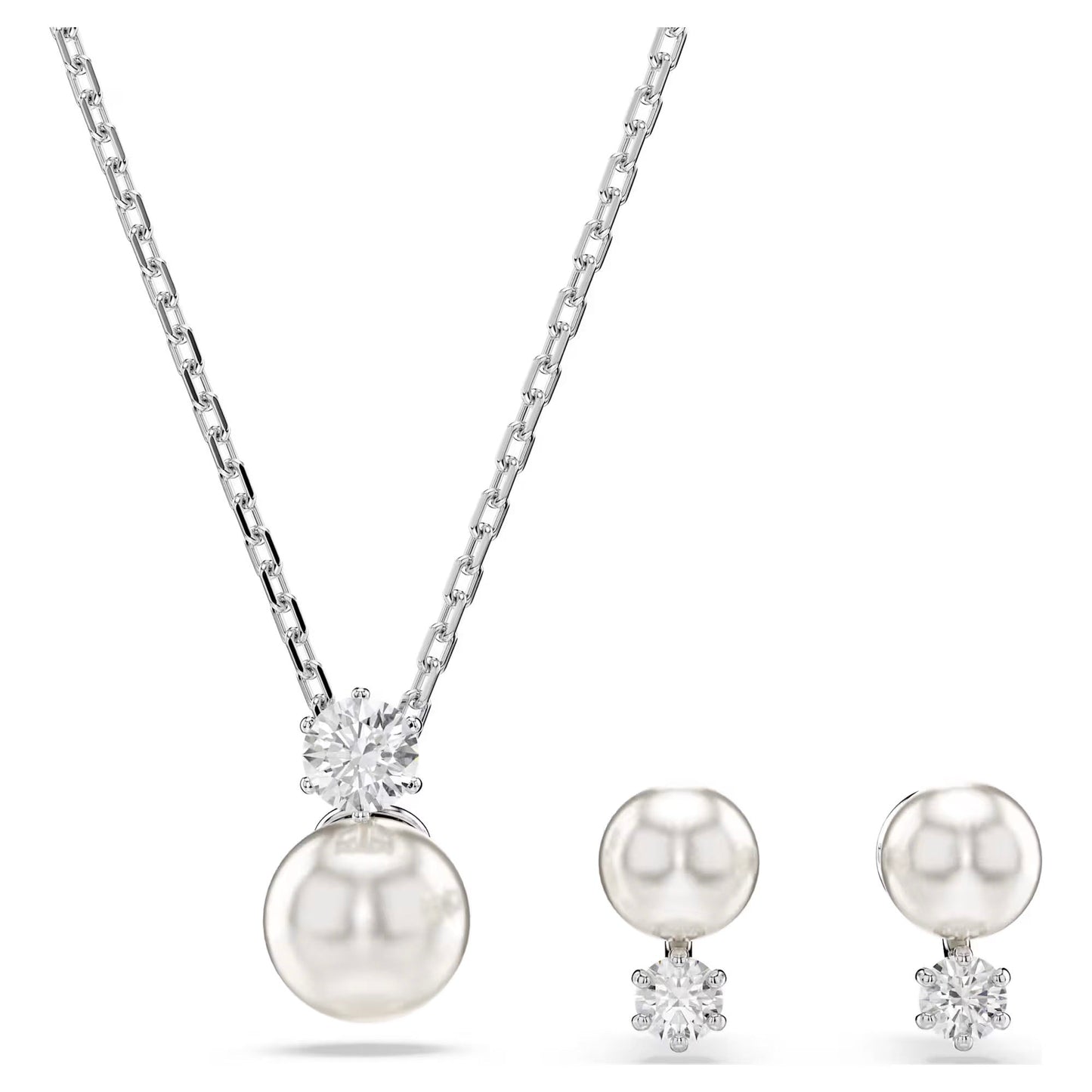 The Swarovski Matrix Earrings and Necklace Set by Swarovski features a sophisticated rhodium-plated silver necklace with a Swarovski Crystal Pearl Matrix pendant and a dazzling star-shaped accent. The set is completed with matching pearl earrings, each embellished with beautiful star accents for an extra hint of radiance.