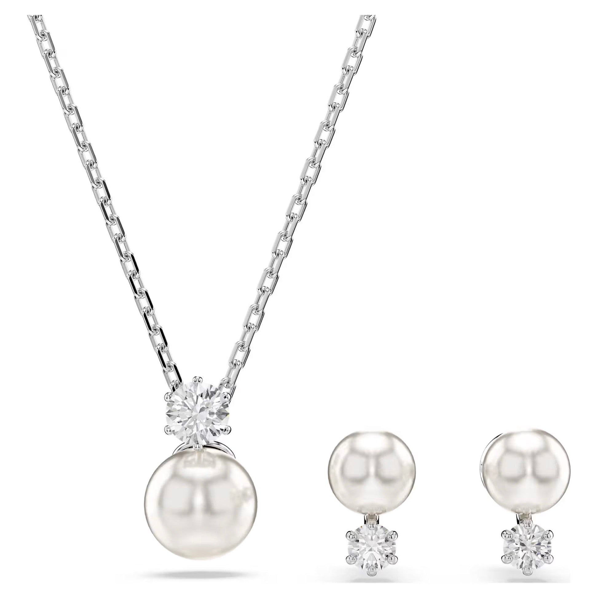 The Swarovski Matrix Earrings and Necklace Set by Swarovski features a sophisticated rhodium-plated silver necklace with a Swarovski Crystal Pearl Matrix pendant and a dazzling star-shaped accent. The set is completed with matching pearl earrings, each embellished with beautiful star accents for an extra hint of radiance.