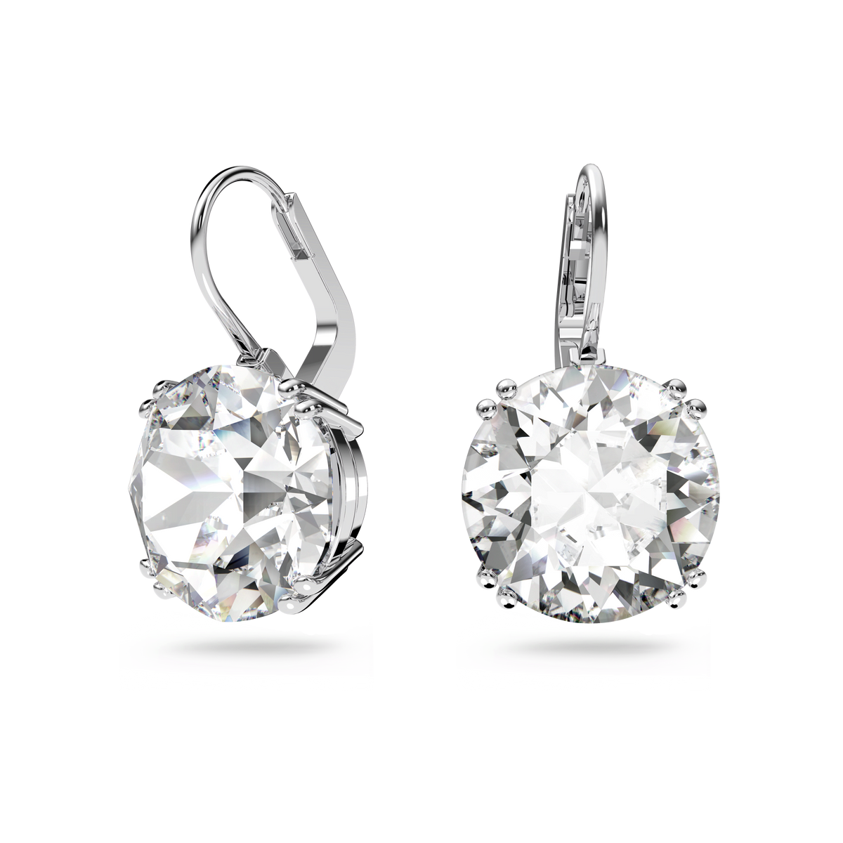 The Swarovski Millenia drop earrings by Swarovski feature large, round-cut white crystals set in secure prong settings and finished with a lustrous rhodium-plated shine, elegantly displayed against a white background.