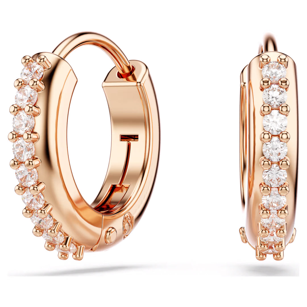 Introducing the Swarovski Matrix Hoop Earrings, an elegant pair of mini hoops in a rose gold-tone, beautifully adorned with sparkling Swarovski Zirconia. Their polished finish is artistically displayed from two angles, accentuating the intricate design and brilliant stones.