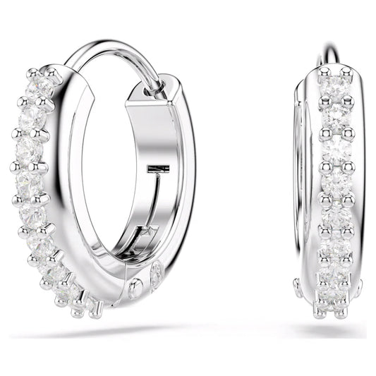 The Swarovski Matrix Hoop Earrings by Swarovski are rhodium-plated mini hoops embellished with small round Swarovski Zirconia along the front. Featuring a hinged closure, these earrings exude a polished and elegant design against a plain white background.