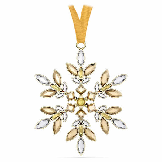 The Swarovski Gema Holiday Ornament Home Décor features a stunning gold and silver snowflake design with marquise-shaped crystals and a geometric center, elegantly suspended by a gold ribbon. This exquisite ornament from the renowned Swarovski brand adds sophistication to any holiday decor.