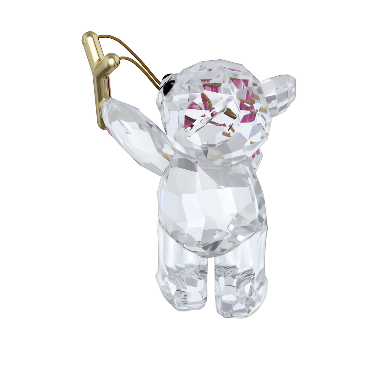 Introducing the Swarovski Kris Bear Sending you Love by Swarovski—a clear crystal collectible figurine adorned with delightful pink accents, holding a gold-colored balloon string and standing upright against a plain white background, making it the perfect Valentine’s gift.