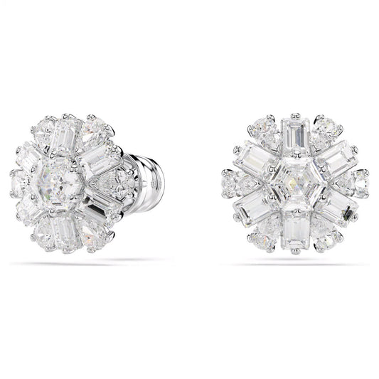 Introducing the Swarovski Idyllia Stud Earrings by Swarovski, these exquisite snowflake-inspired earrings showcase a floral design with a sparkling arrangement of round and emerald-cut stones set in rhodium-plated metal.