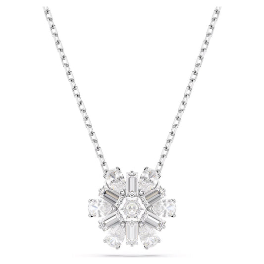 Introducing the Swarovski Idyllia Necklace Pendant from the renowned brand Swarovski: a rhodium-plated silver necklace adorned with a snowflake motif featuring sparkling Swarovski Zirconia, elegantly crafted with a combination of baguette and round cuts. The pendant elegantly suspends from a refined chain.