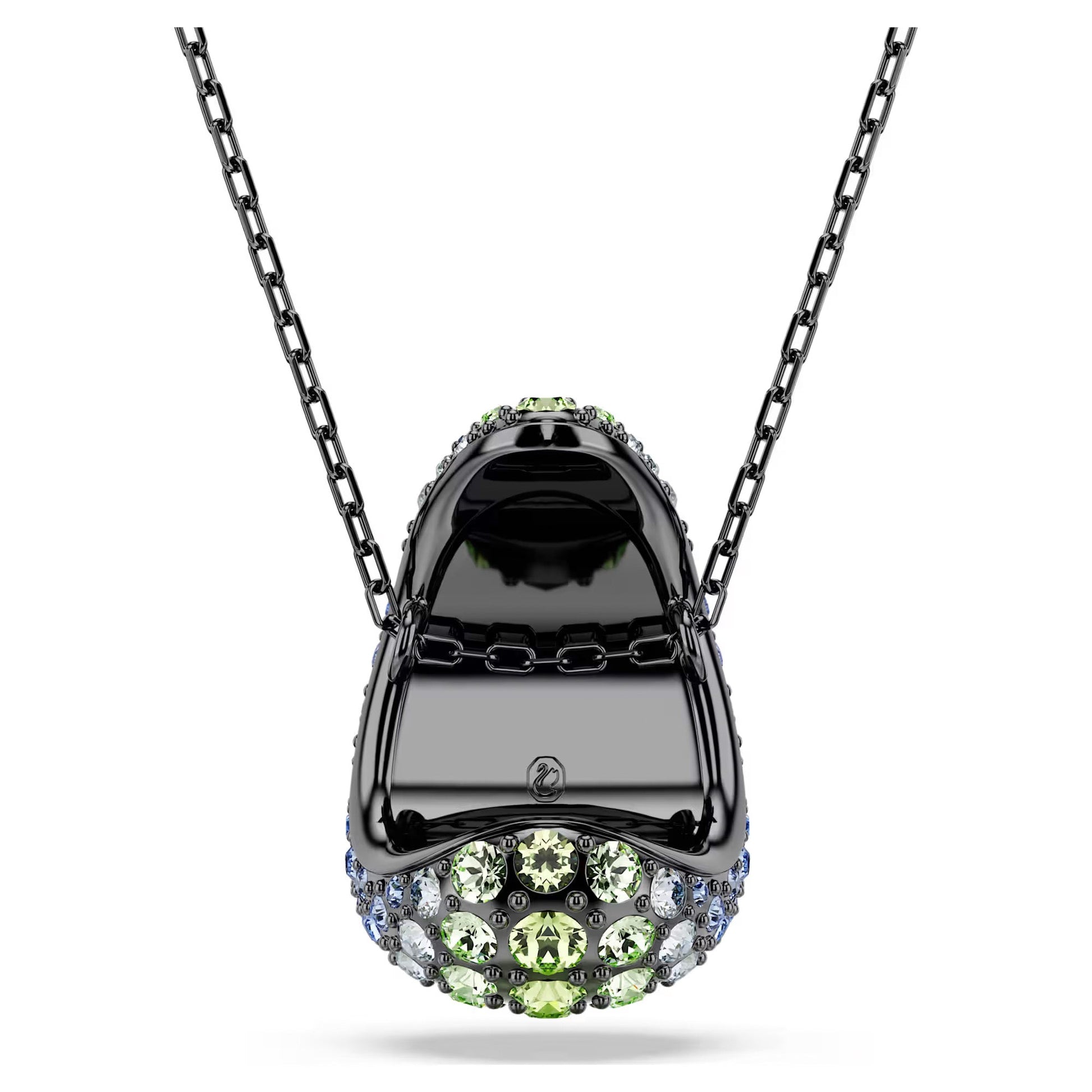 The Swarovski Sublima Necklace Pendant from the brand Swarovski showcases a sneaker-shaped pendant, embellished with ocean-themed shades of green and blue crystals, all elegantly suspended on a smooth silver chain.