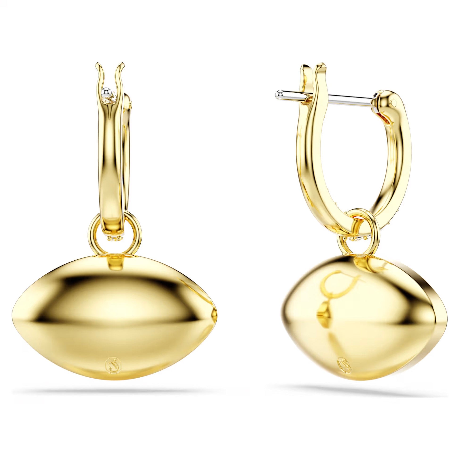 The Swarovski Symbolica Evil Eye Drop Earrings are a pair of gold hoops featuring football-shaped pendants that exude mystical glamour. Their smooth, shiny surfaces radiate elegance, while the subtle evil eye motifs against the white backdrop add an enchanting touch.