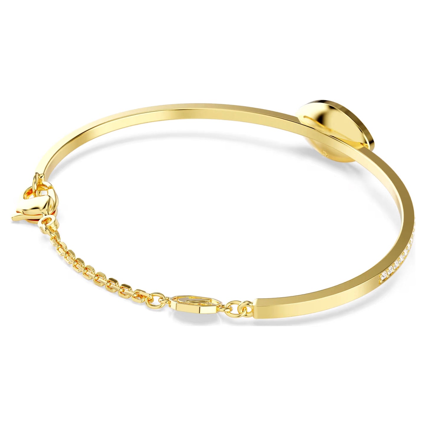 The Swarovski Symbolica Evil Eye Bangle, by Swarovski, is a gold-tone plated piece that highlights a narrow band with a small clasp and an additional fastening chain. Elegantly designed, it features a smooth, round, flat decorative element on top reminiscent of the classic evil eye motif.