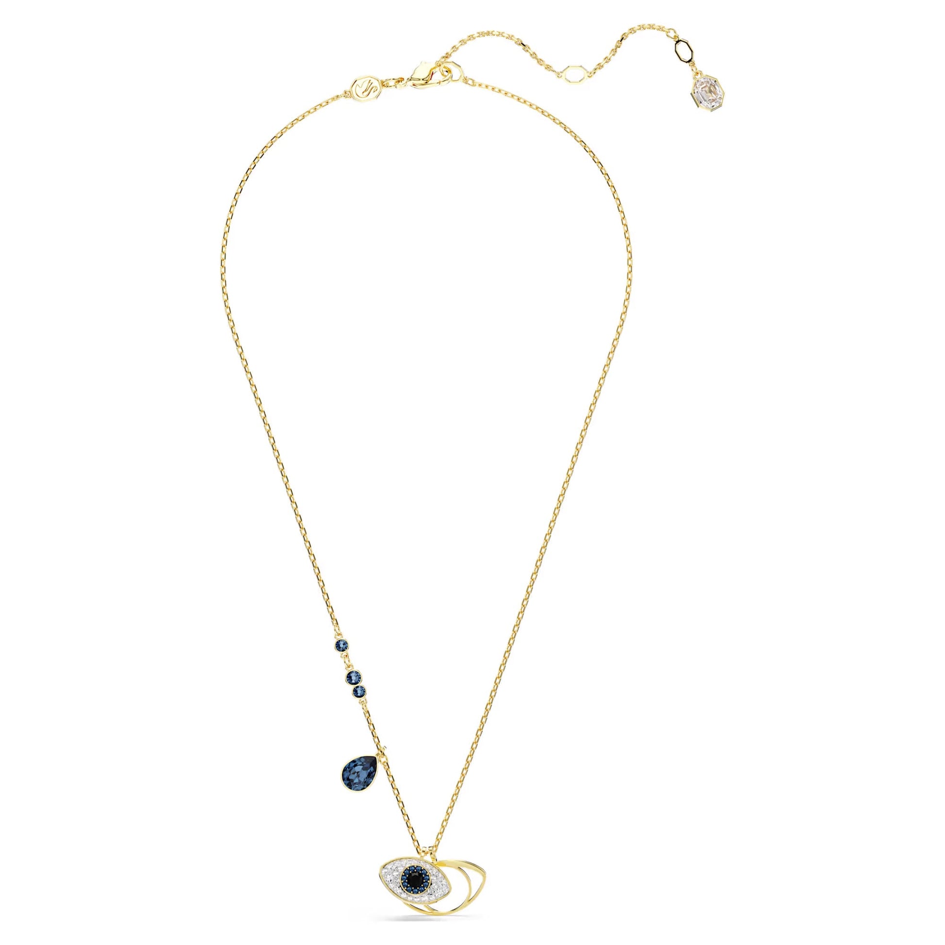 A Swarovski gold chain necklace features a Symbolica Evil Eye pendant, showcasing a blue and silver design with an evil eye motif. The pendant includes a blue teardrop gem and three round beads on the chain.