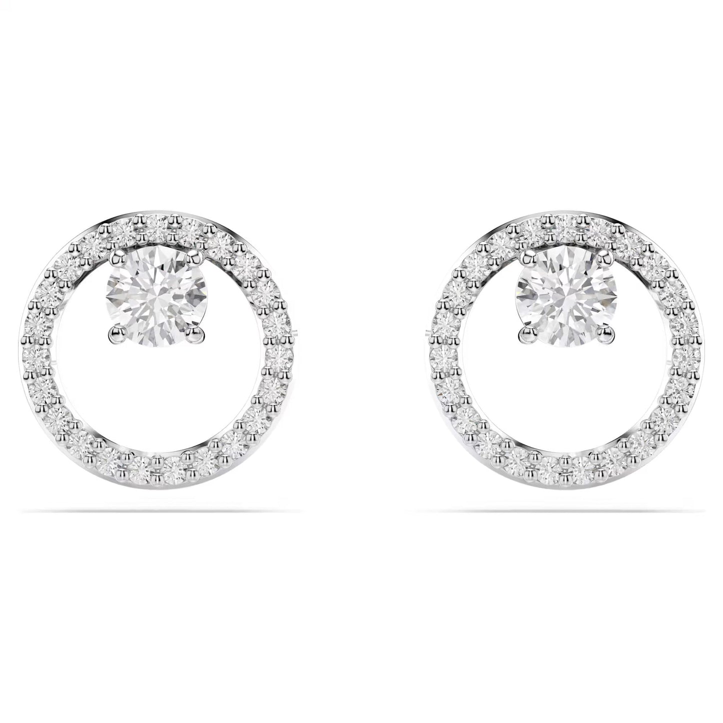 The Swarovski Constella Stud Earrings feature a stunning round central diamond encircled by smaller diamonds, amplifying their brilliance. With a rhodium-plated finish for extra sophistication, they shimmer beautifully against a simple white background, providing an elegant and refined appearance.