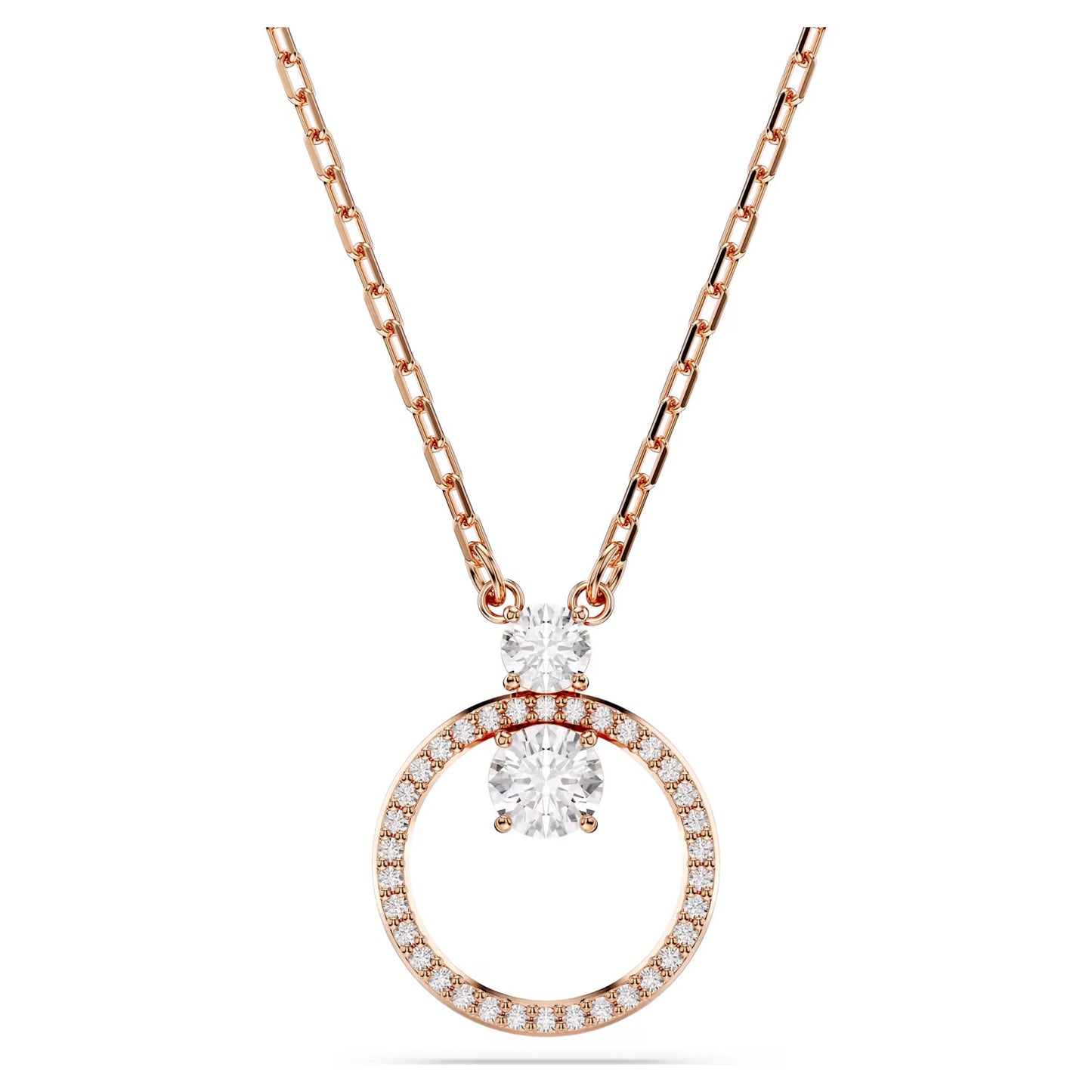 The Swarovski Constella Necklace Pendant by Swarovski features a rose gold-tone plated necklace with a circular pendant adorned with shimmering Swarovski Zirconia. The graceful design is highlighted by a prominent central stone encircled by smaller stones, making it an ideal accessory for adding sophistication to any outfit.