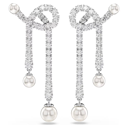 Introducing the Swarovski Matrix Drop Earrings by Swarovski: These elegant dangling earrings showcase a sparkling crystal loop design adorned with Swarovski Zirconia and an array of gemstones, culminating in a single drop of Swarovski Crystal Pearl. They exude sophisticated luxury.