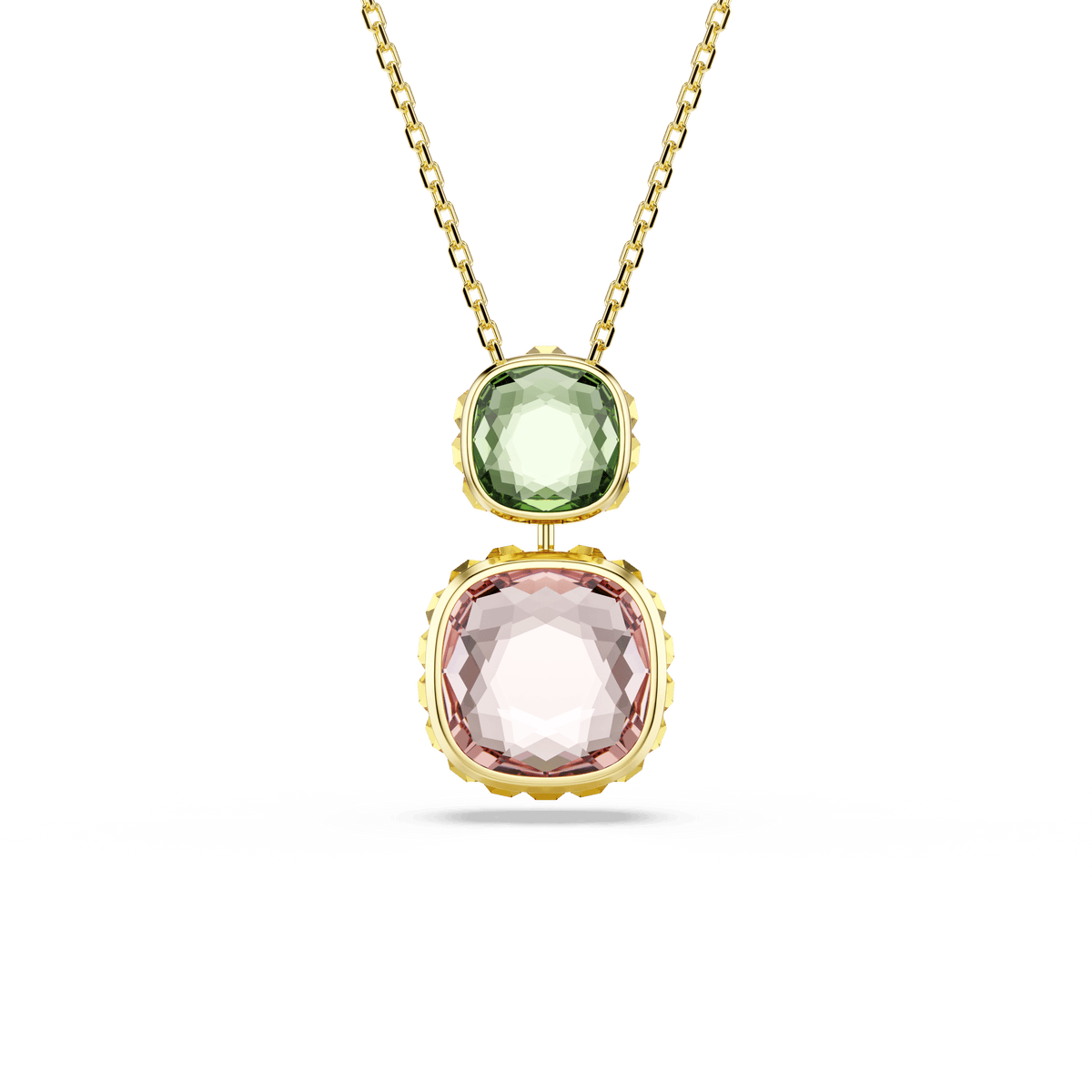 The Swarovski Chroma pendant features two cushion-cut gemstones—a smaller light green Swarovski ReCreated crystal atop a larger light pink stone—set in an 18K gold finish, creating a striking multicolored look on this gold necklace.