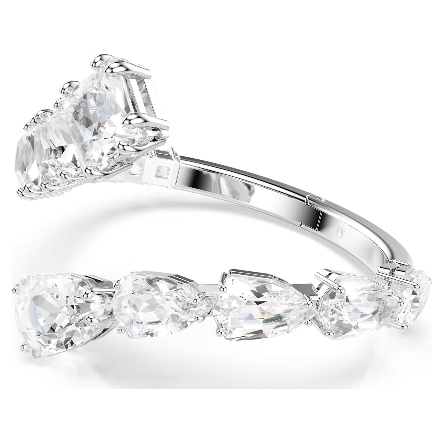 The Swarovski Matrix Bangle, an elegant statement piece from the renowned brand Swarovski, is crafted in sleek rhodium-plated silver and features a stunning row of large, clear pear-shaped gemstones. These meticulously cut crystals sparkle brilliantly against the polished metal band.