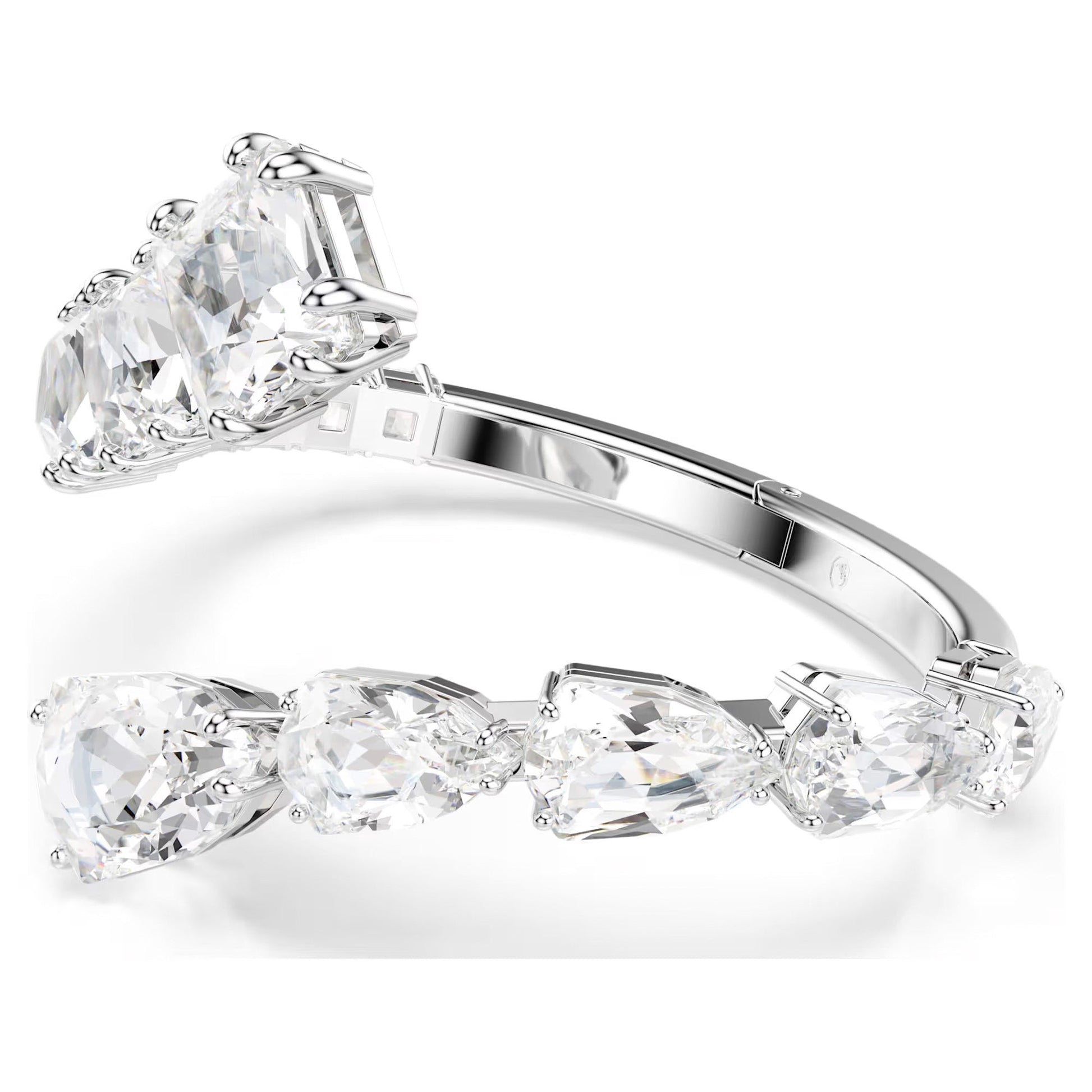The Swarovski Matrix Bangle, an elegant statement piece from the renowned brand Swarovski, is crafted in sleek rhodium-plated silver and features a stunning row of large, clear pear-shaped gemstones. These meticulously cut crystals sparkle brilliantly against the polished metal band.