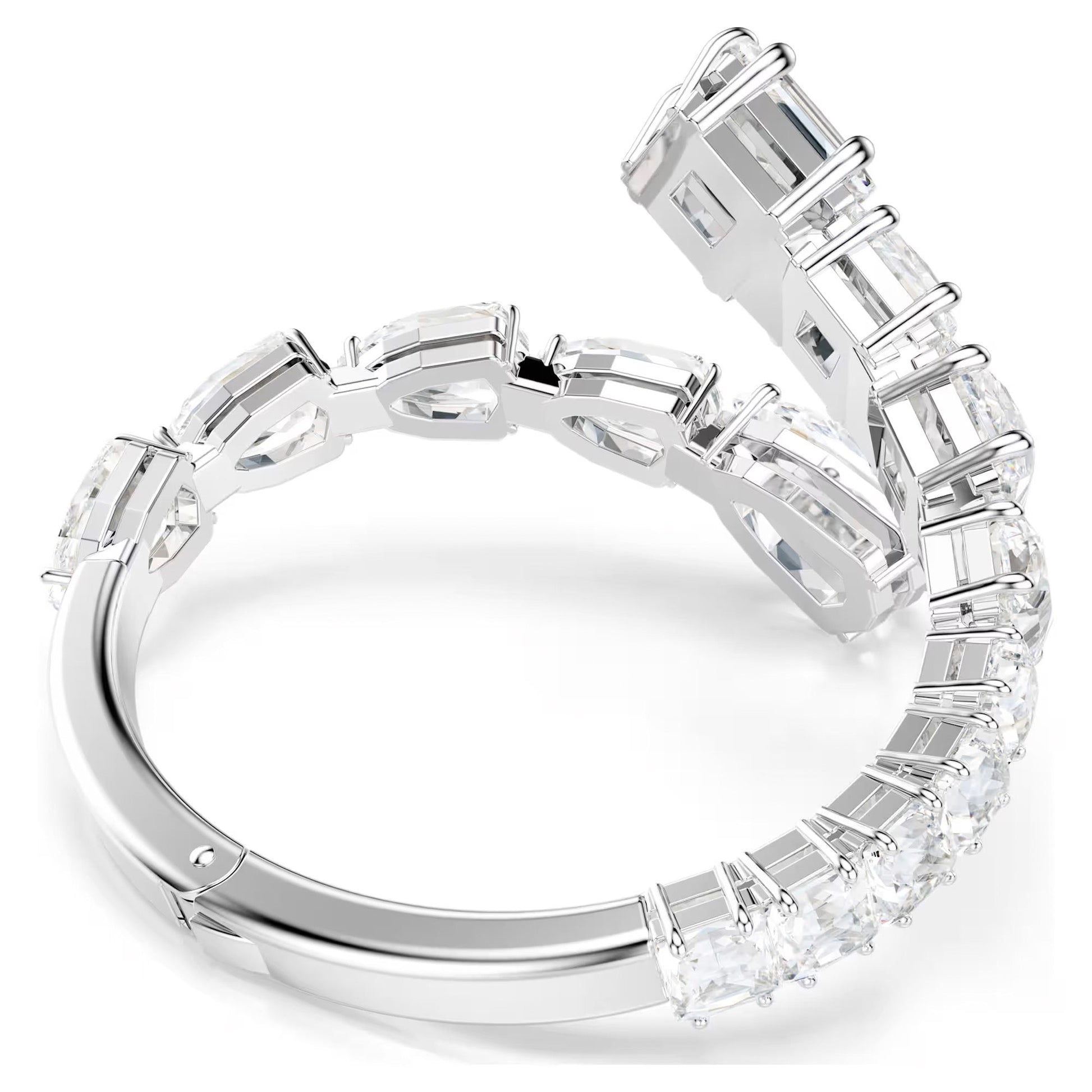 The Swarovski Matrix Bangle by Swarovski is a modern and luxurious piece, featuring a rhodium-plated silver design with elegantly arranged rectangular clear crystals in a continuous pattern.