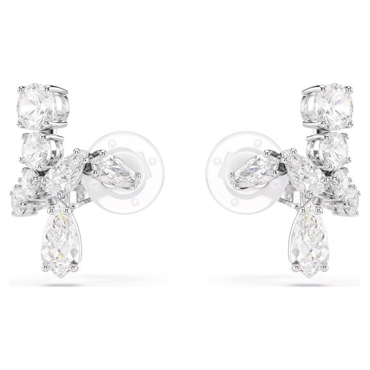 A pair of Swarovski Matrix Clip Earrings from Swarovski, elegantly showcasing multiple sparkling diamonds and Swarovski Zirconia in various cuts, set in a symmetrical design. These earrings have a shiny silver backing that reflects light to enhance their brilliance and are rhodium plated for added elegance.
