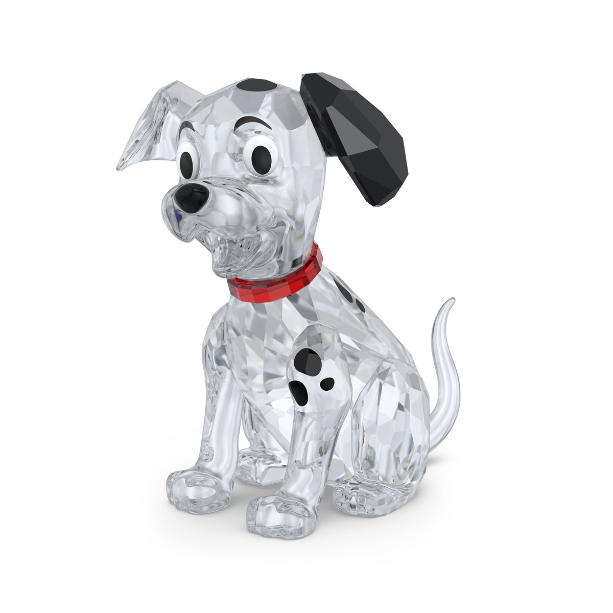 The Swarovski Disney Classics 101 Dalmatians - Lucky figurine by Swarovski is a collectible crystal Dalmatian puppy, inspired by Disney’s 101 Dalmatians. Featuring a sparkling faceted design, the puppy wears a red collar, showcases black spots and one black ear, and sits facing forward against a plain white background.