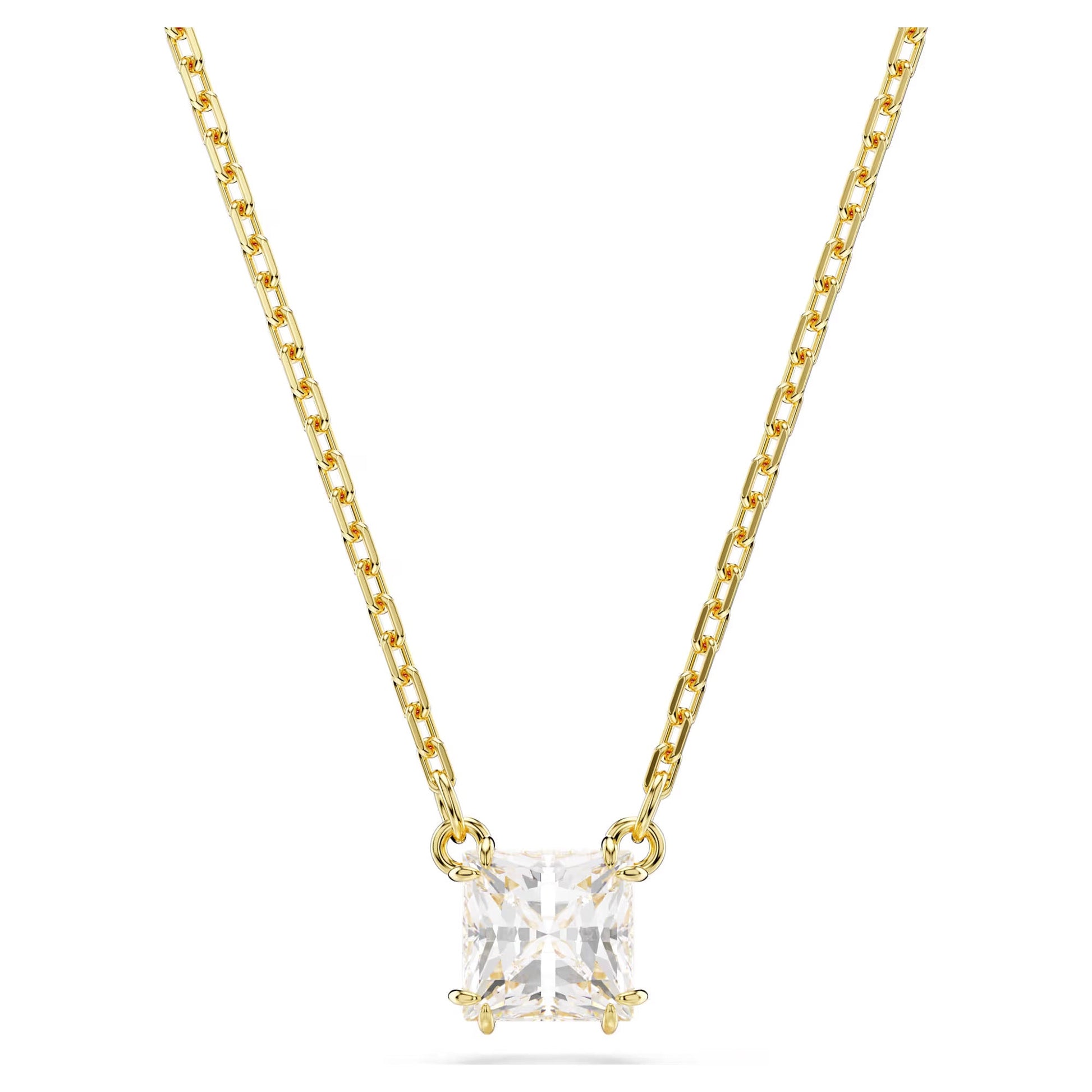The Swarovski Stilla Attract Necklace Pendant by Swarovski features a gold-tone plated chain with a square-cut Swarovski Zirconia pendant. The stone is securely held in place by a four-prong setting, and the chain boasts a smooth, polished finish. This design offers an elegant and minimalist appeal.