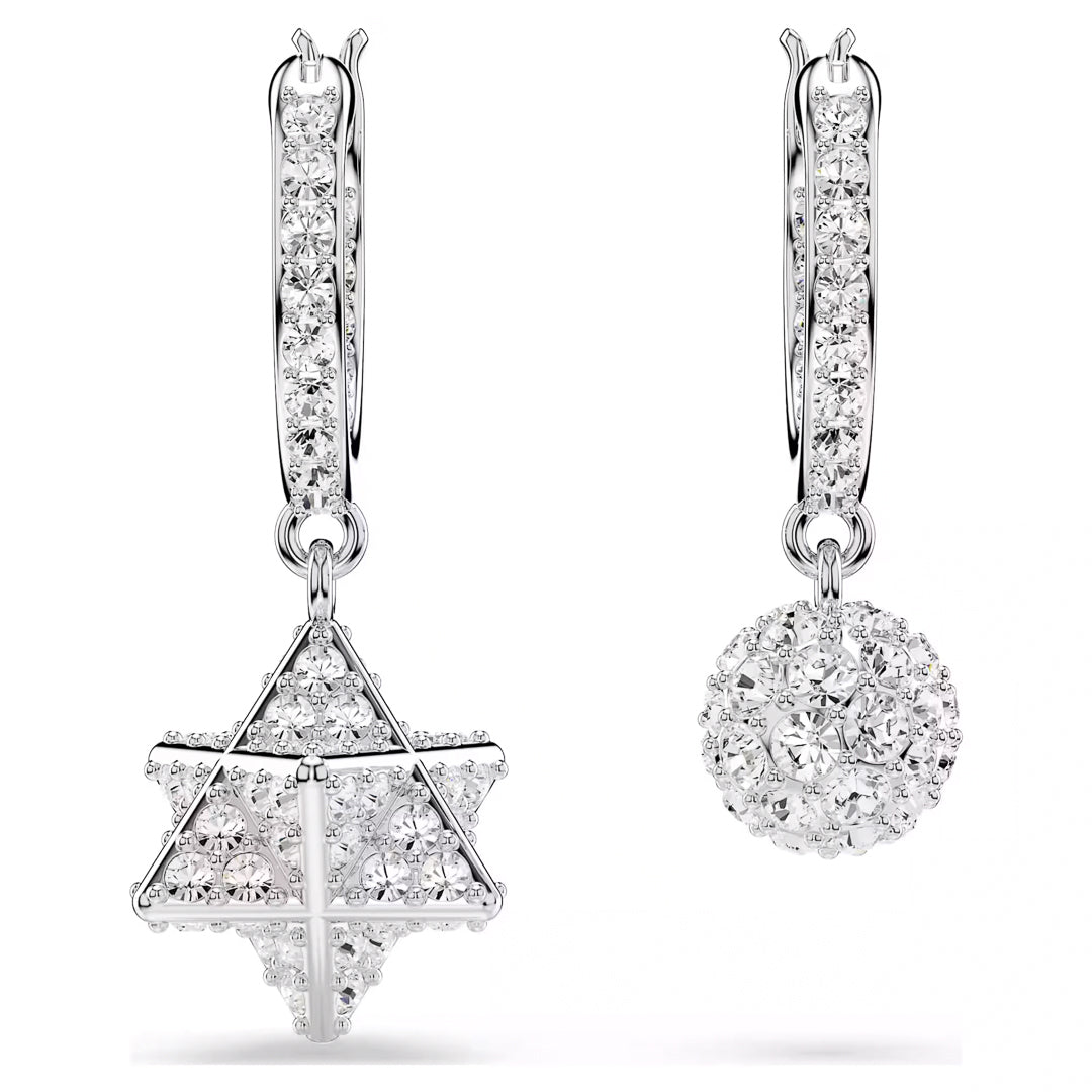 Close-up of the Swarovski Dextera Hoop Earrings, elegantly crafted with rhodium plating and adorned with clear crystals. One earring features a dazzling star-shaped pendant, while the other showcases a radiant spherical charm, both glistening with sparkling stones.