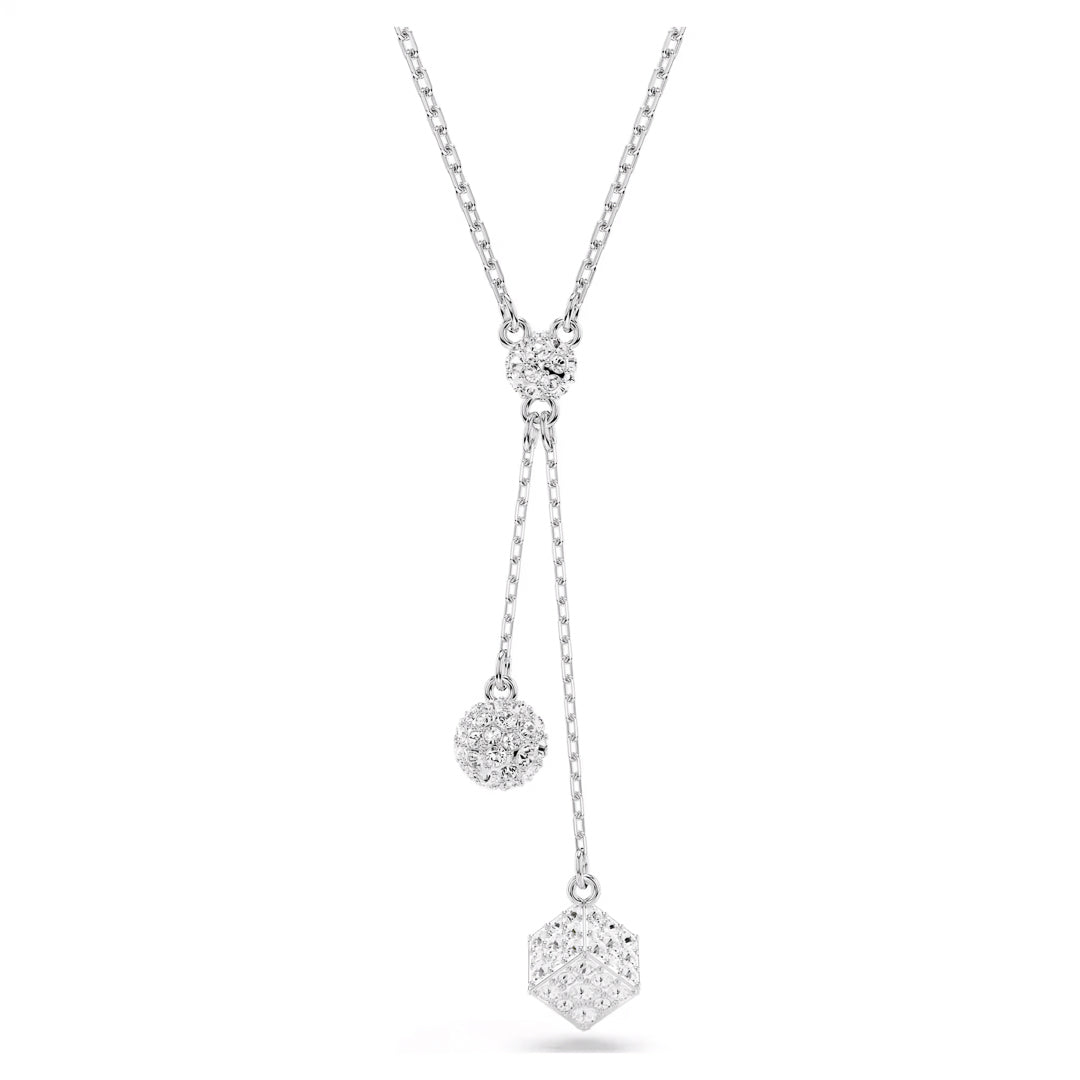 This rhodium-plated necklace, named the Swarovski Dextera Necklace Pendant by Swarovski, features a striking Y-shaped design. It highlights a Curiosa pendant adorned with sparkling clear crystals and includes two distinct pendants: one spherical, encrusted with small stones, and another in a hexagonal shape embellished with stones.