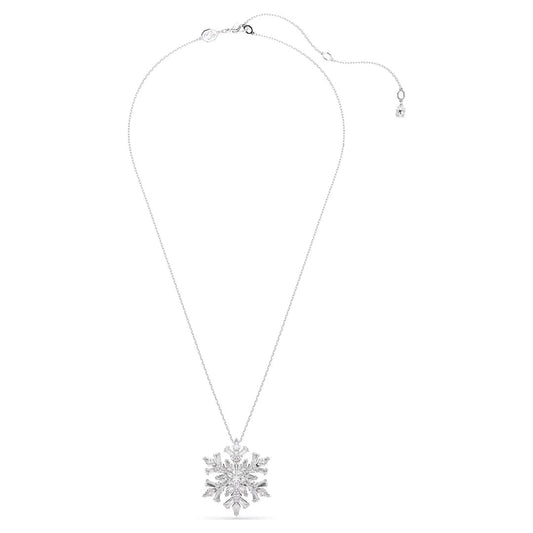 The Swarovski Idyllia Necklace features a rhodium-plated pendant with a snowflake motif. It includes a delicate, adjustable chain adorned with a small decorative bead at the clasp. The intricate and symmetrical design enhances its elegance, making it an ideal accessory for any occasion.