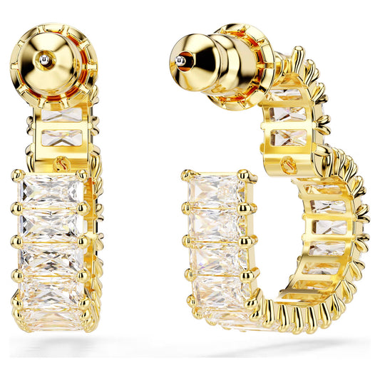 Introducing the Swarovski Matrix Heart Hoop Earrings by Swarovski, featuring a sophisticated gold-tone plated design. These earrings are adorned with glittering rectangular Swarovski Zirconia gemstones arranged vertically along the front. Held in gold prongs, this elegant arrangement blends vibrant sophistication with timeless style.