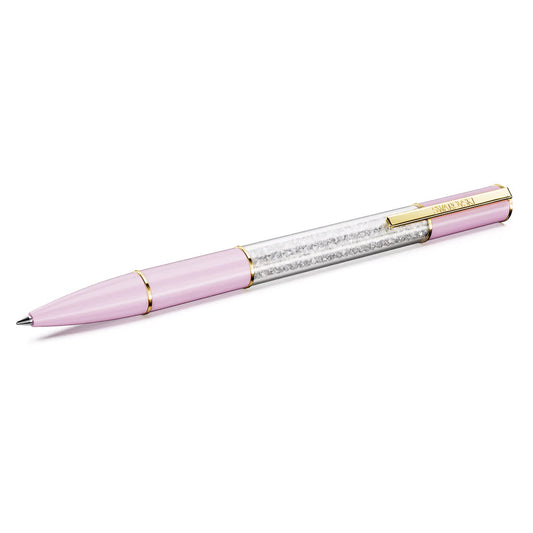 The Swarovski Crystalline Lustre Ballpoint Pen is a pink pen with gold accents, featuring a section filled with clear Swarovski crystals encased in a transparent shell. It's displayed diagonally against a white background, radiating elegance.