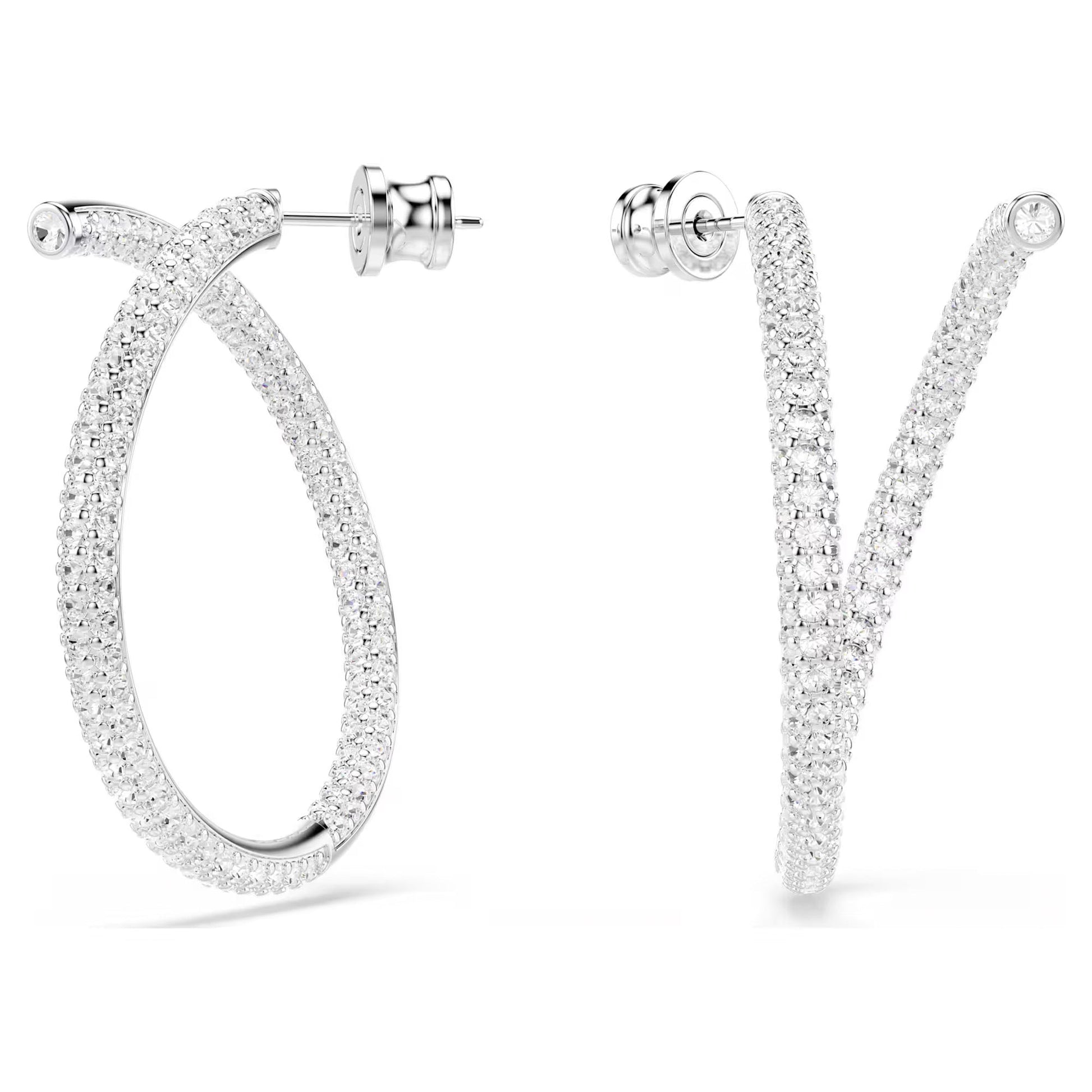 A pair of Swarovski Dextera Hoop Earrings encrusted with small diamonds. The intricate design features clear pavé and showcases overlapping loops, reflecting light for a dazzling effect. These rhodium-plated hoops are displayed from both a side angle and head-on view against a white background.