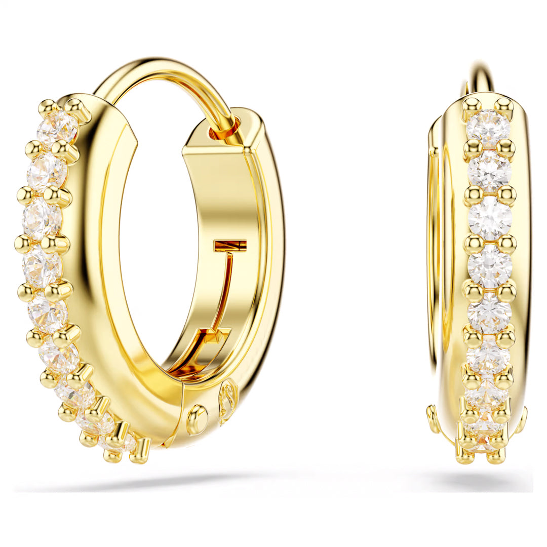Introducing the Swarovski Matrix Hoop Earrings by Swarovski: these gold-tone plated hoops are embellished with brilliant Swarovski Zirconia along their outer edge. Their refined design is complete with a push clasp closure, elegantly presenting the luxurious style of these mini hoops against a plain white backdrop.