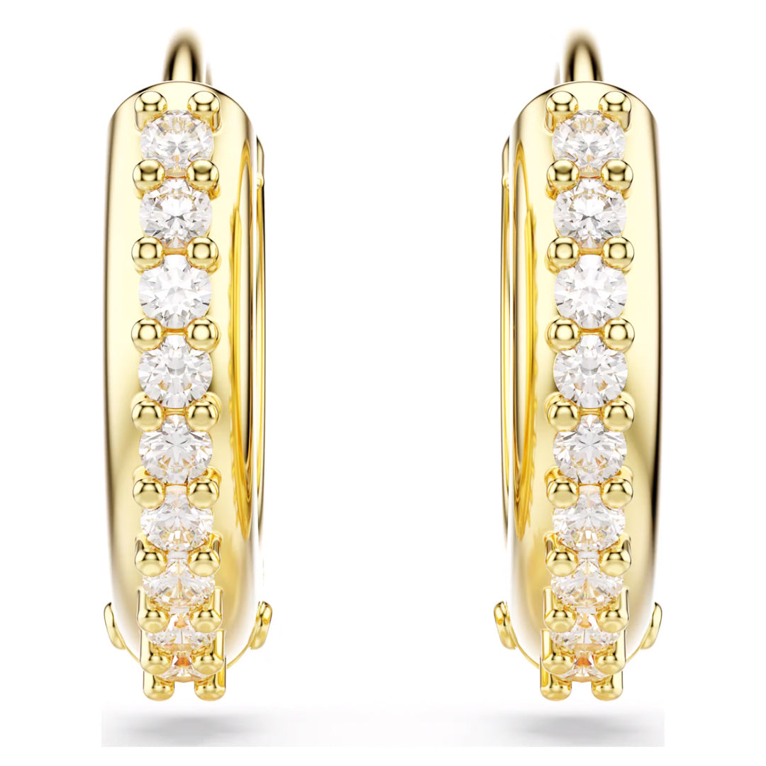 The Swarovski Matrix Hoop Earrings, crafted by Swarovski with a gold-tone plating and featuring a row of shimmering Swarovski Zirconia, are displayed on a white background, highlighting their elegant and shiny design.
