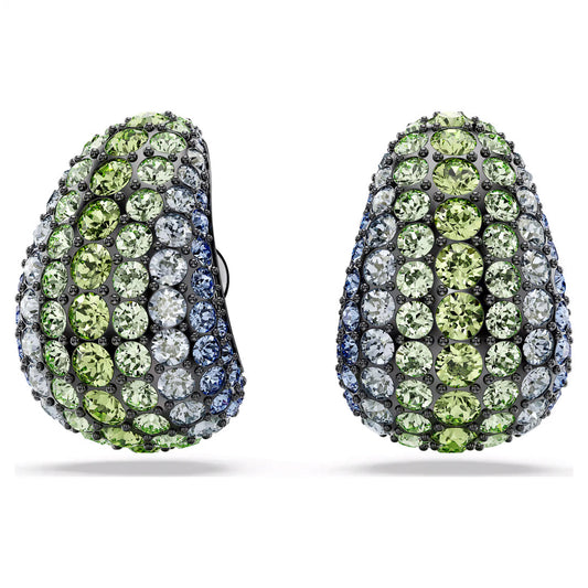 A detailed view of the Swarovski Sumlima Drop Earrings reveals their teardrop shape, plated with ruthenium and adorned with shimmering green, blue, and clear marine crystals. The gemstones display an ombre effect, meticulously set close together to achieve a luxurious and intricate look.