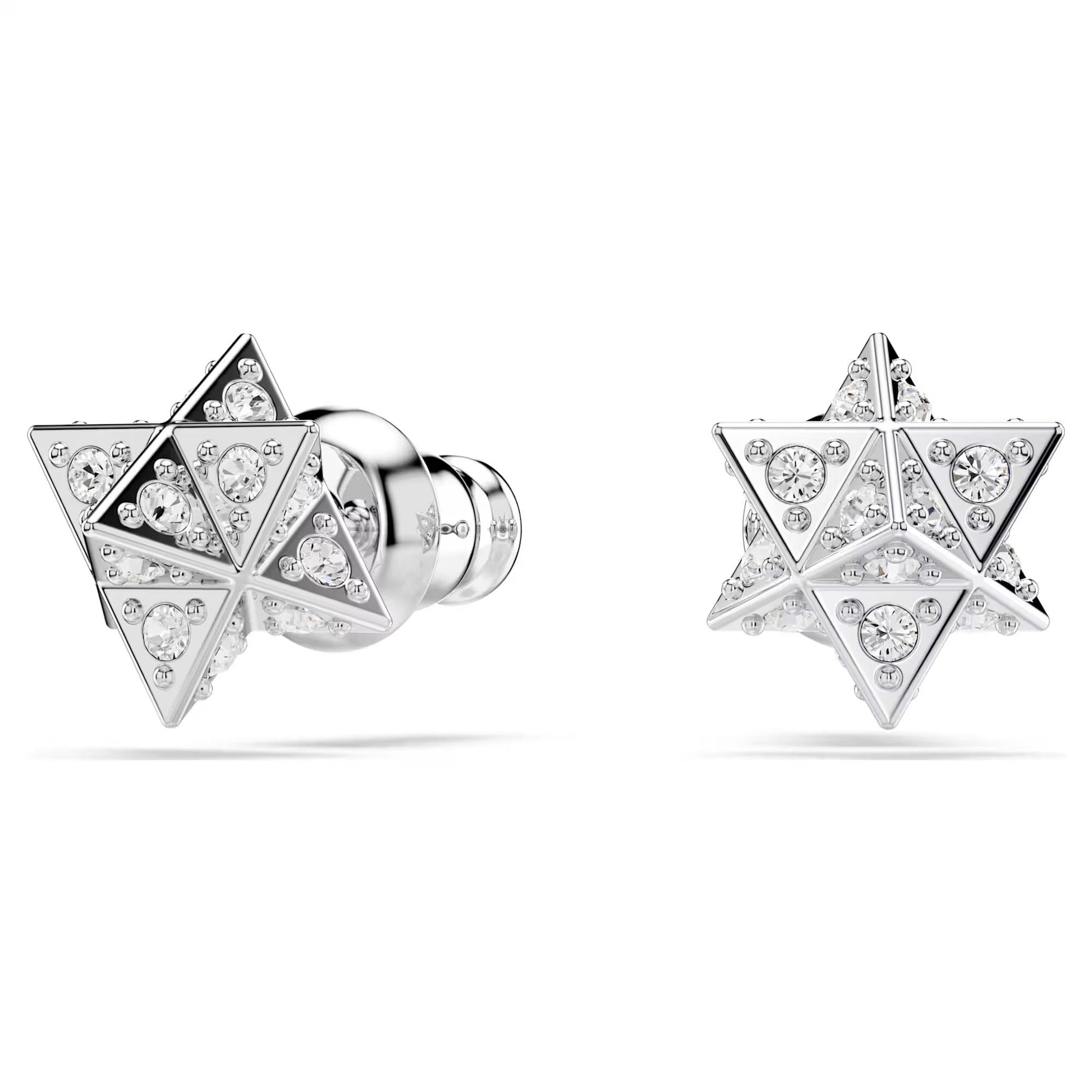 These Swarovski Dextera Star Stud Earrings are rhodium-plated and star-shaped, crafted from silver. They are embellished with small, sparkling crystals and feature a geometric faceted design with a glossy finish that elegantly reflects light. One stud is displayed standing upright while the other lies on its side.