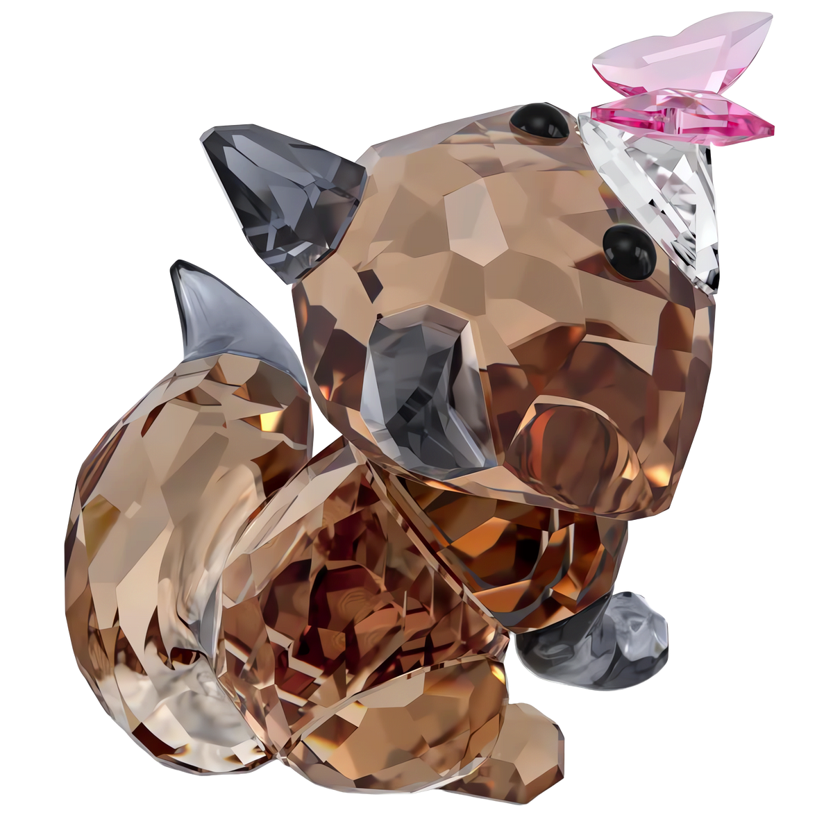 The Swarovski Idyllia Fox and Butterfly by Swarovski features a faceted crystal figurine of a brown fox with gray accents, sitting as it gazes up at a delicate pink crystal butterfly perched on its nose—a charming piece that captures the whimsical beauty of nature.