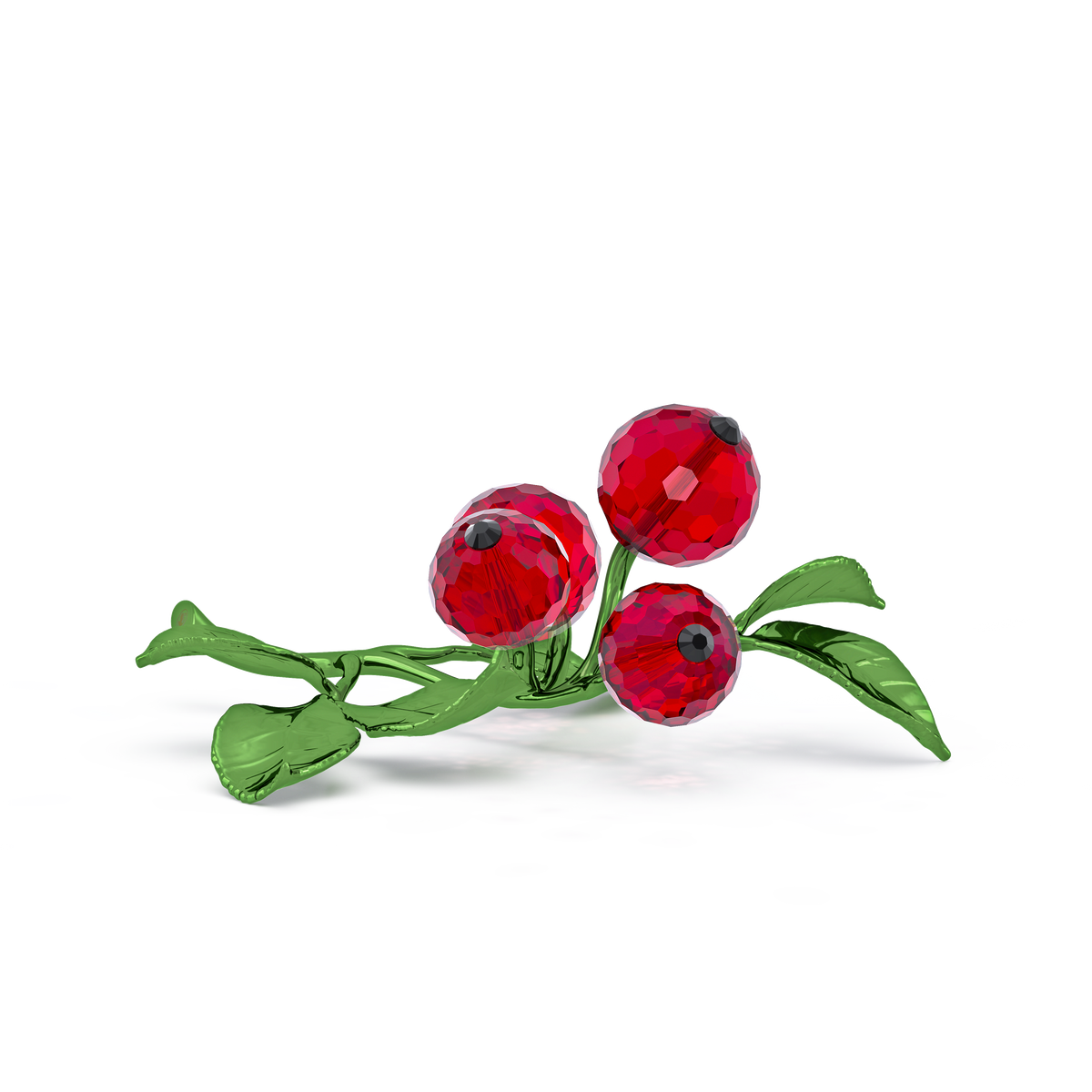 The Swarovski Idyllia Red Berries by Swarovski features three faceted red berries with green leaves and stems, elegantly crafted in crystal and set against a plain white background—making it a refined decoration perfect for seasonal décor.