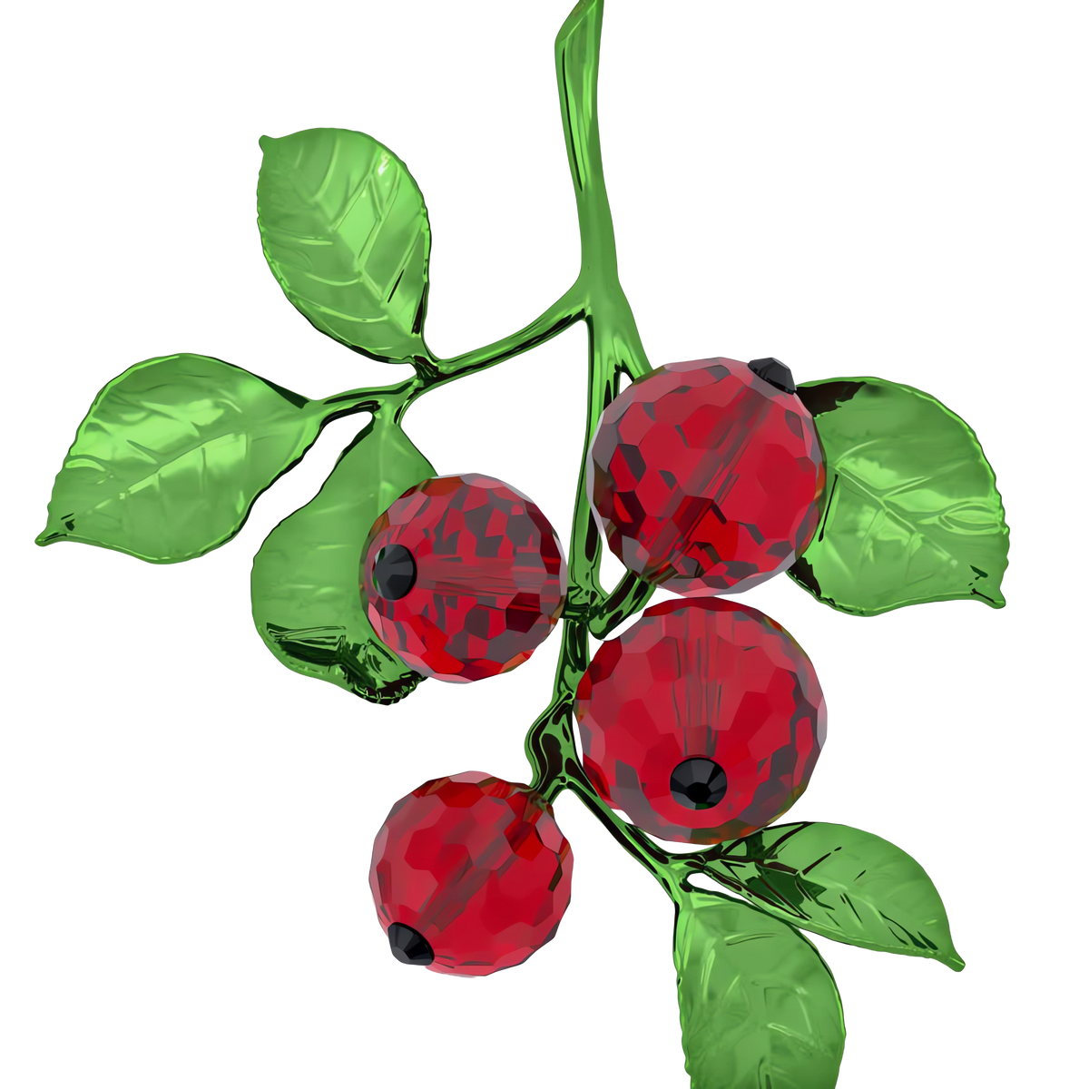 The Swarovski Idyllia Red Berries by Swarovski features three faceted red crystal berries and smooth green leaves arranged on a branch, creating a striking seasonal décor piece that beautifully catches the light against a white background.