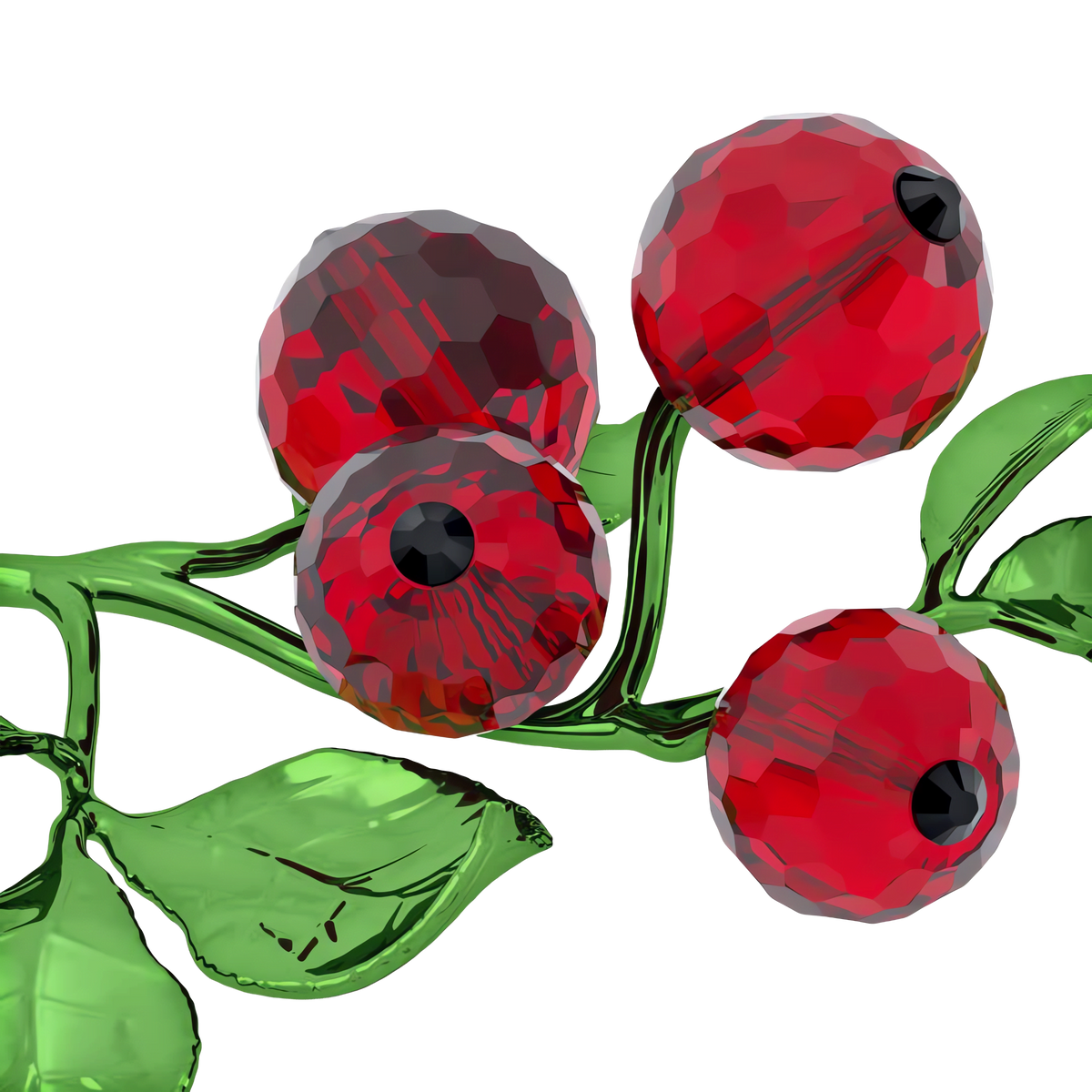 A close-up of the Swarovski Idyllia Red Berries, featuring four faceted crystal berries with black centers on a green glass branch with leaves, set against a white background—an exquisite Swarovski decoration perfect for seasonal décor.