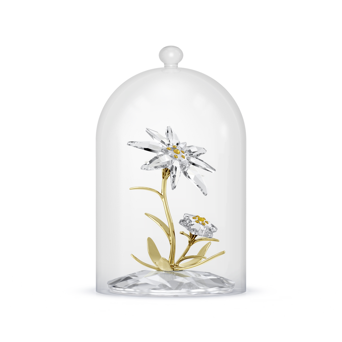 Encased in a clear glass dome reminiscent of the Swarovski Florere 130th Anniversary Bell Jar, two crystal and gold flowers with green leaves are displayed on a faceted base against a white background.