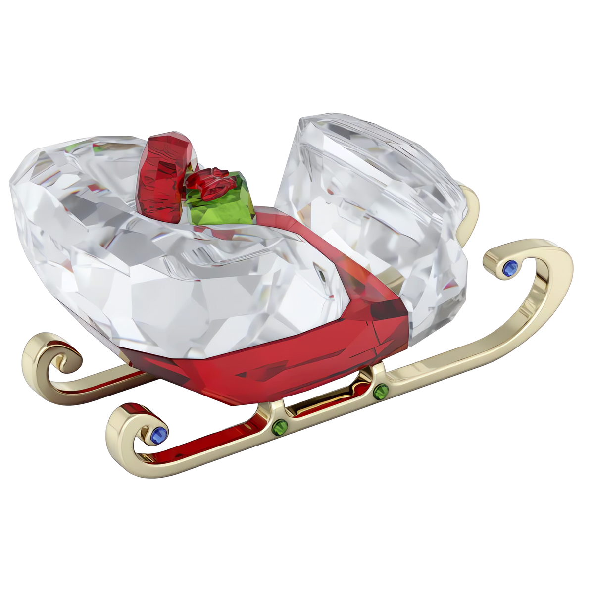 Bring festive sparkle to your home with the Swarovski Holiday Cheers Sleigh by Swarovski, a radiant holiday decoration crafted in crystal and gold tones. This elegant Santa sleigh figurine features a vivid red seat, carries a cheerful green and red gift, and is adorned with sparkling blue and green gemstone accents along the runners.